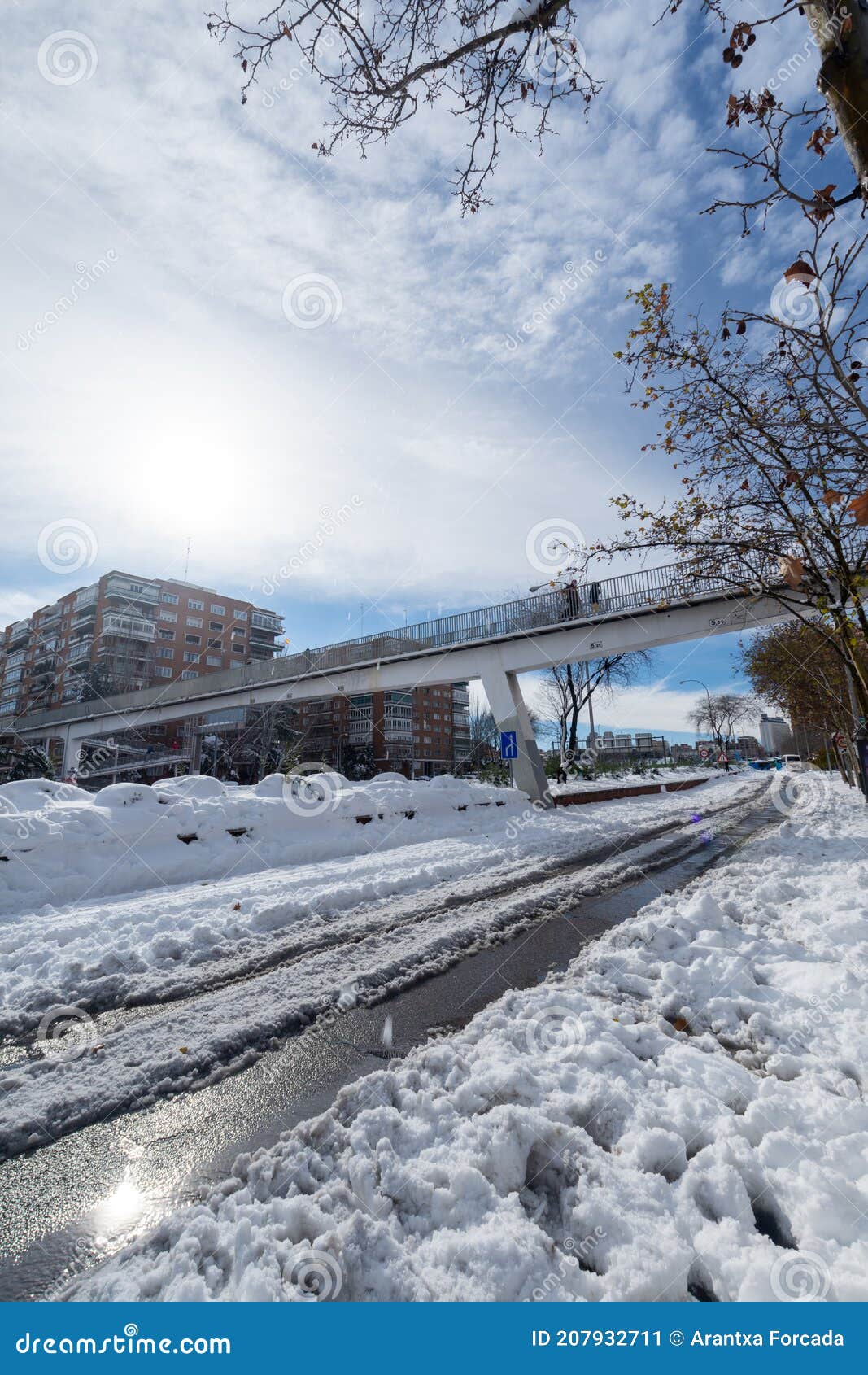 angular view of an a2 highway bridge with snow, a sunny day, madrid, spain, europe, january 10, 2021,