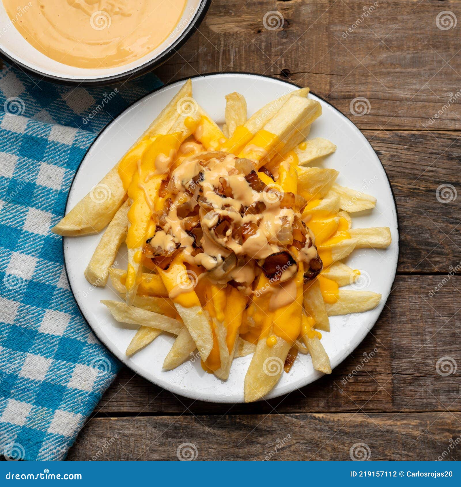 Animal Style Fries with Cheese and Caramelized Onion on Wooden Background  Stock Photo - Image of catsup, portion: 219157112