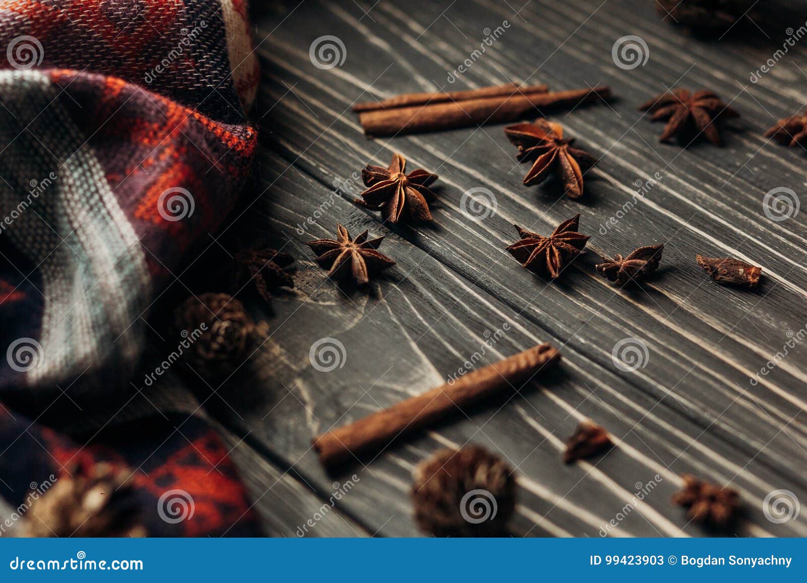 anise cinnamon on wooden rustic background. space for text. stylish winter or autumn wallpaper. cozy mood. seasonal holidays