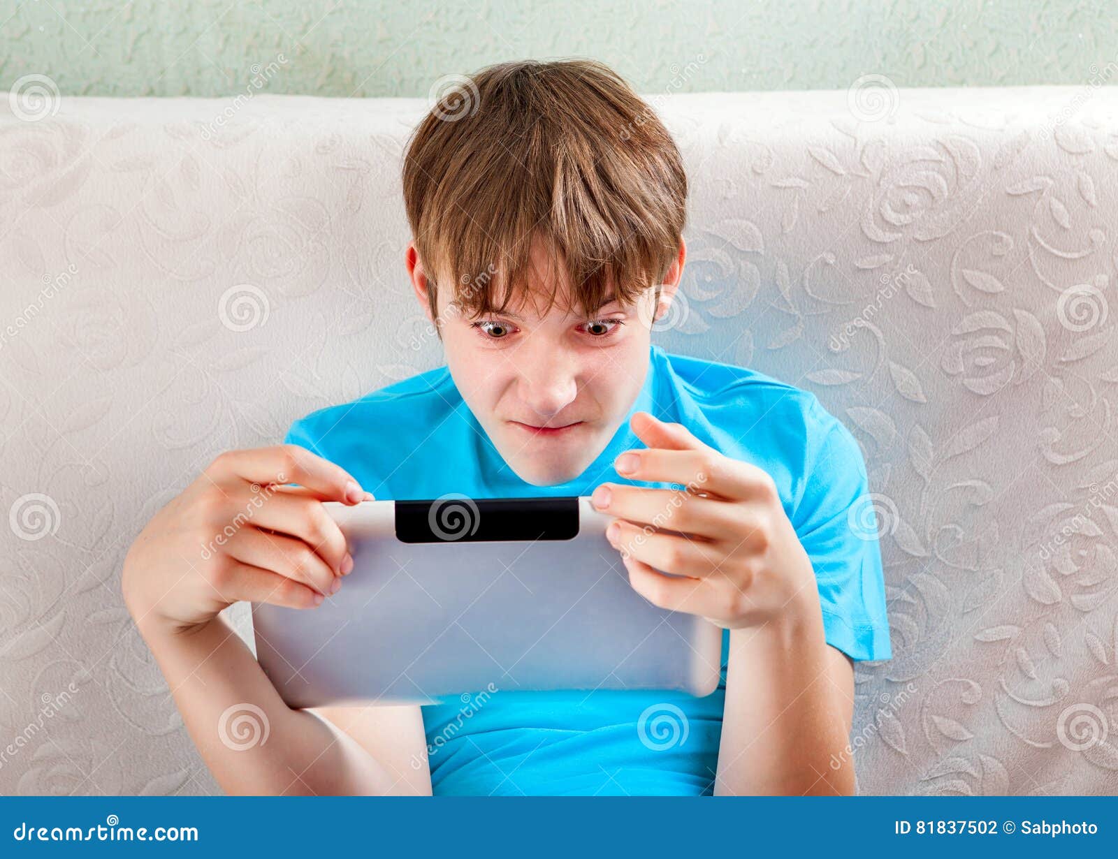 Annoyed Teenager with a Tablet Stock Photo - Image of chat, information ...