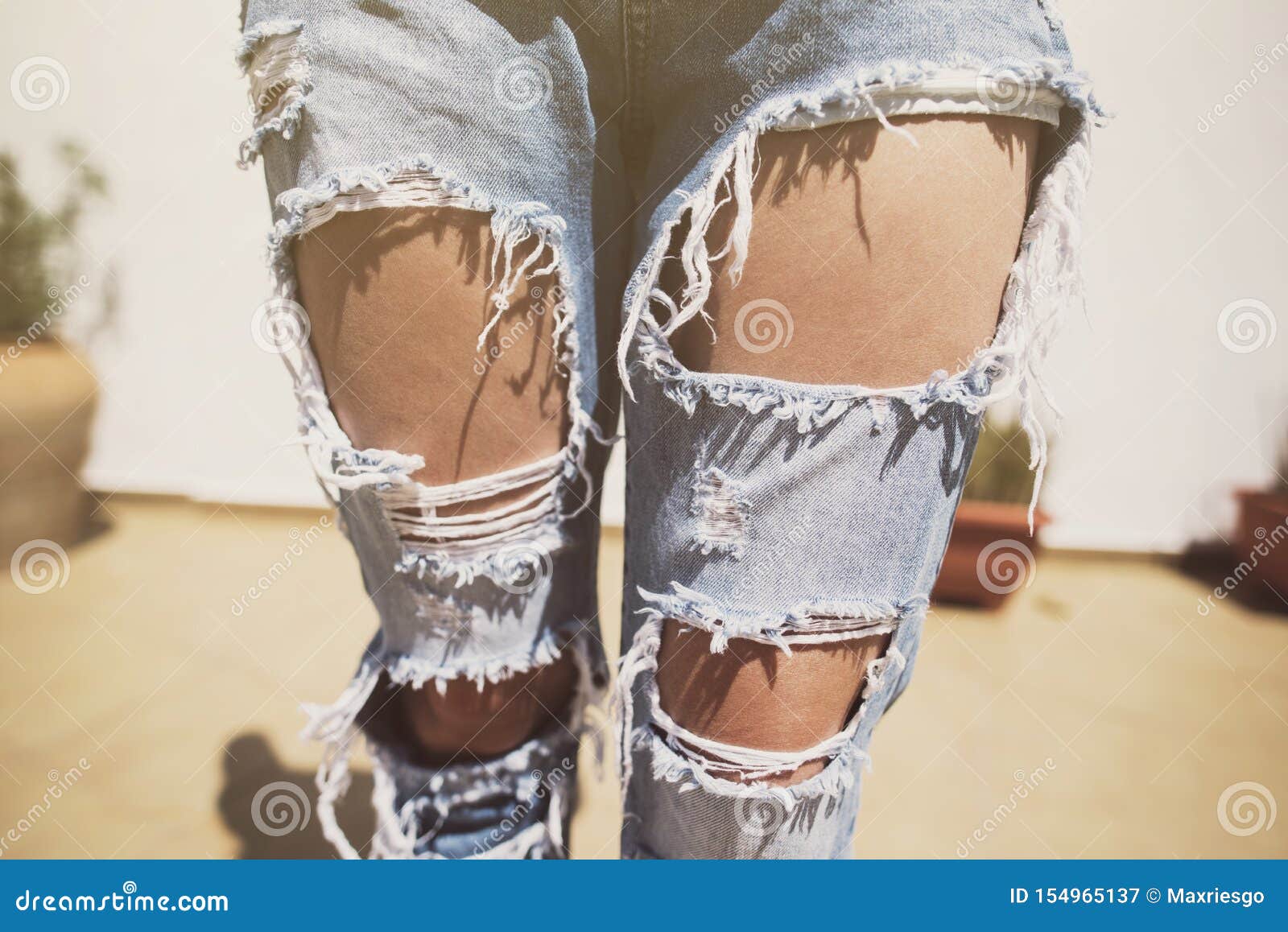 Anonymous Image of Woman with Torn Jeans on a Summer Day Stock Image ...