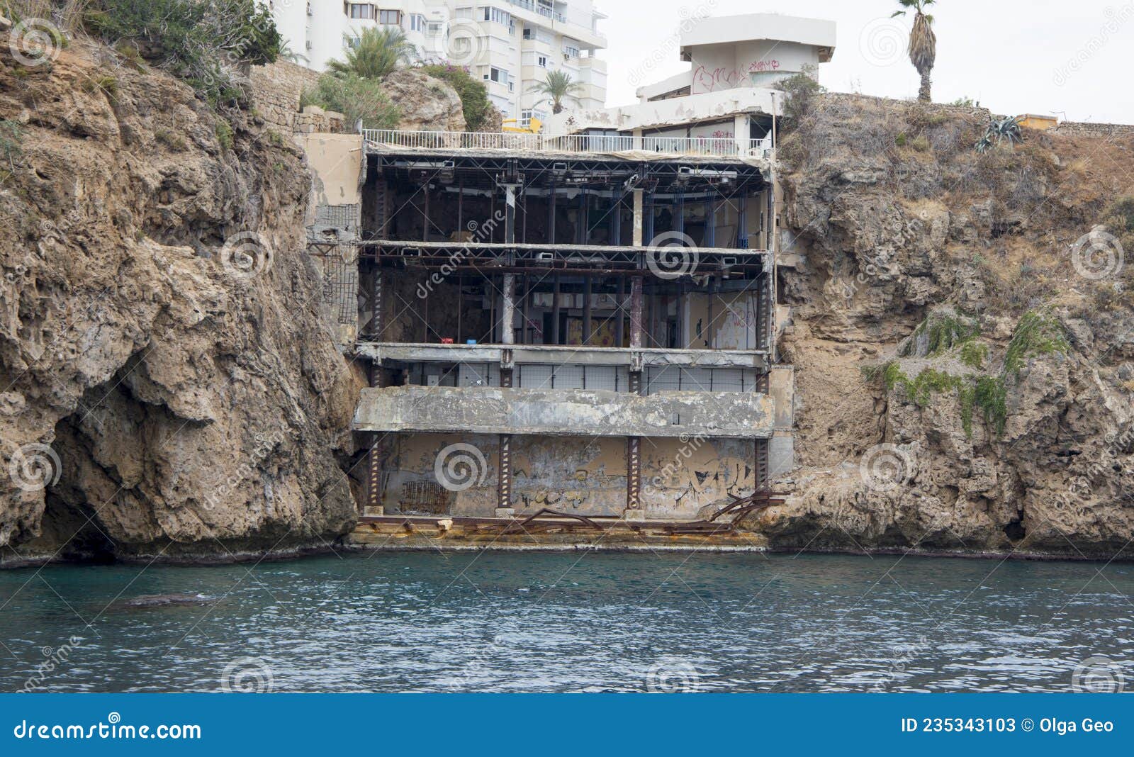 antaliya, turkey - october 30 2021: abandoned building in the rock