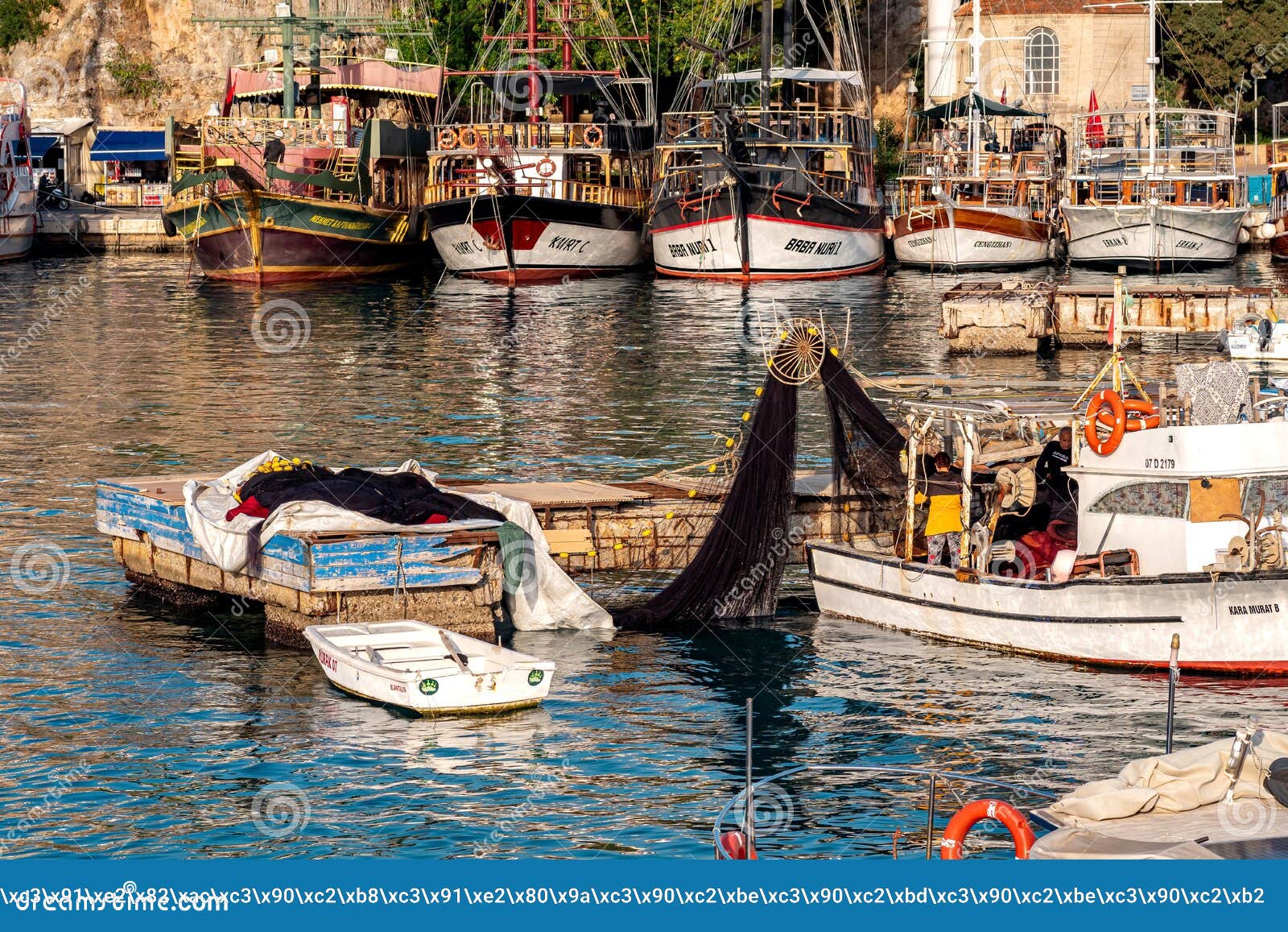 Fishermen Check the Nets on a Fishing Boat Against the Background of  Recreational Ships in Vintage Style in the Ancient Harbor in Editorial  Stock Image - Image of popular, mediterranean: 242488734