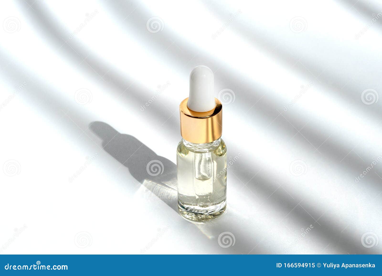 anti aging serum with collagen and peptides in glass bottle with dropper