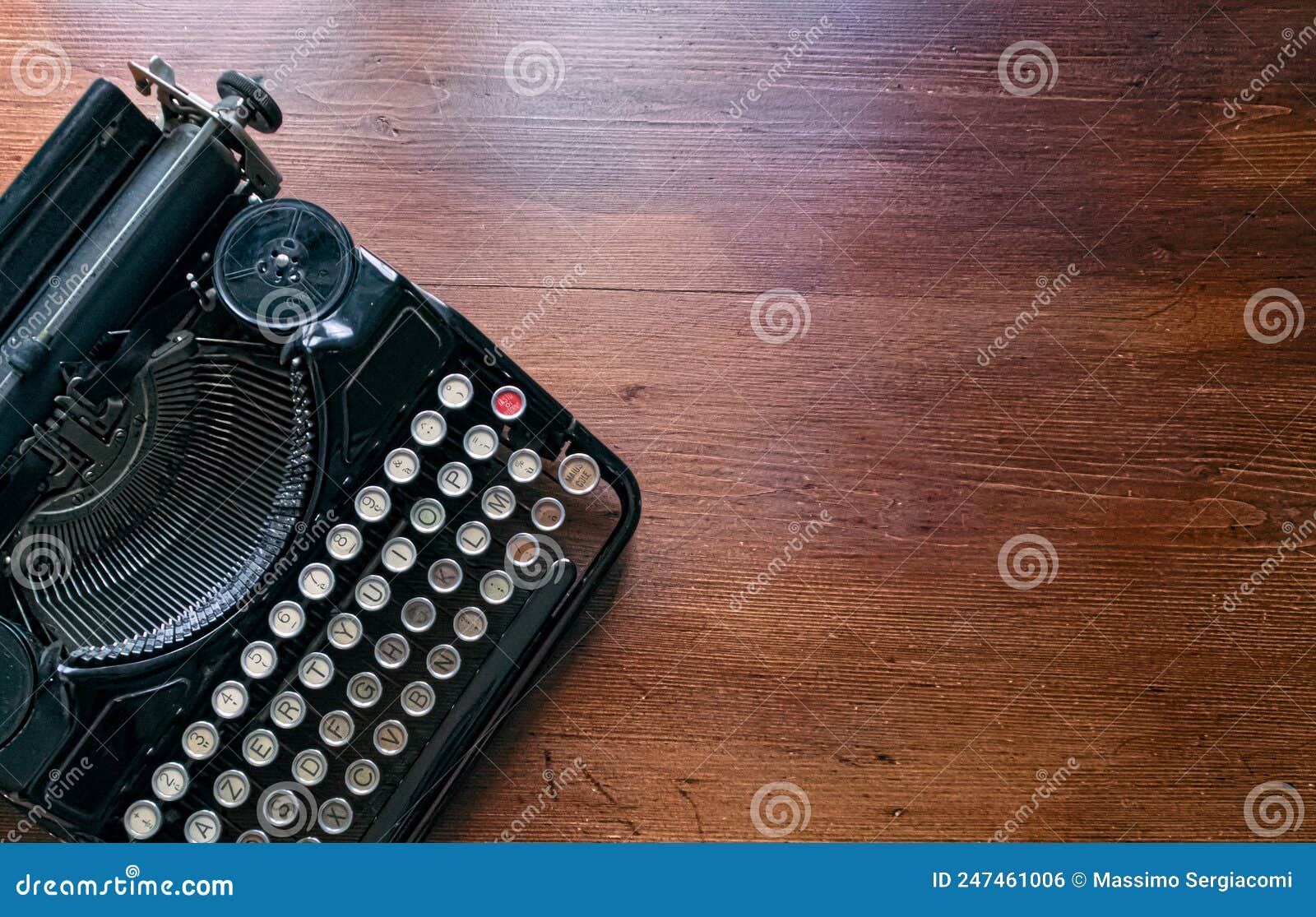 ancient typewriter on vintage background