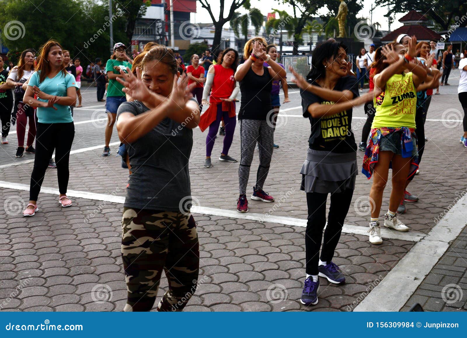 Adult Filipino Ladies Participate In A Zumba Or Dance Exercise Class At A Public Park Editorial