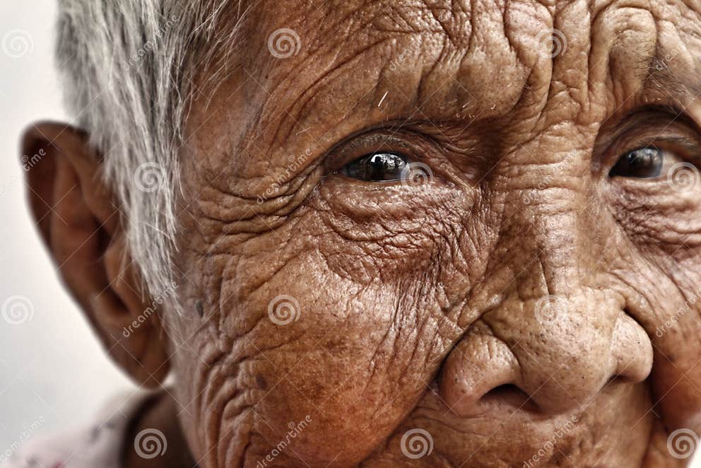 Close Up Portrait Of An Old Filipino Woman With Wrinkled Skin Editorial