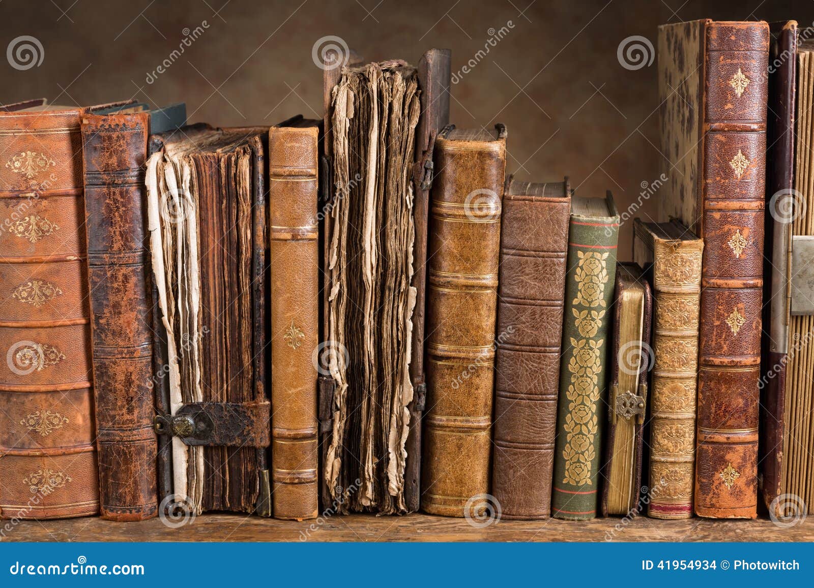 Antique books in a row stock photo. Image of books, antique 41954934