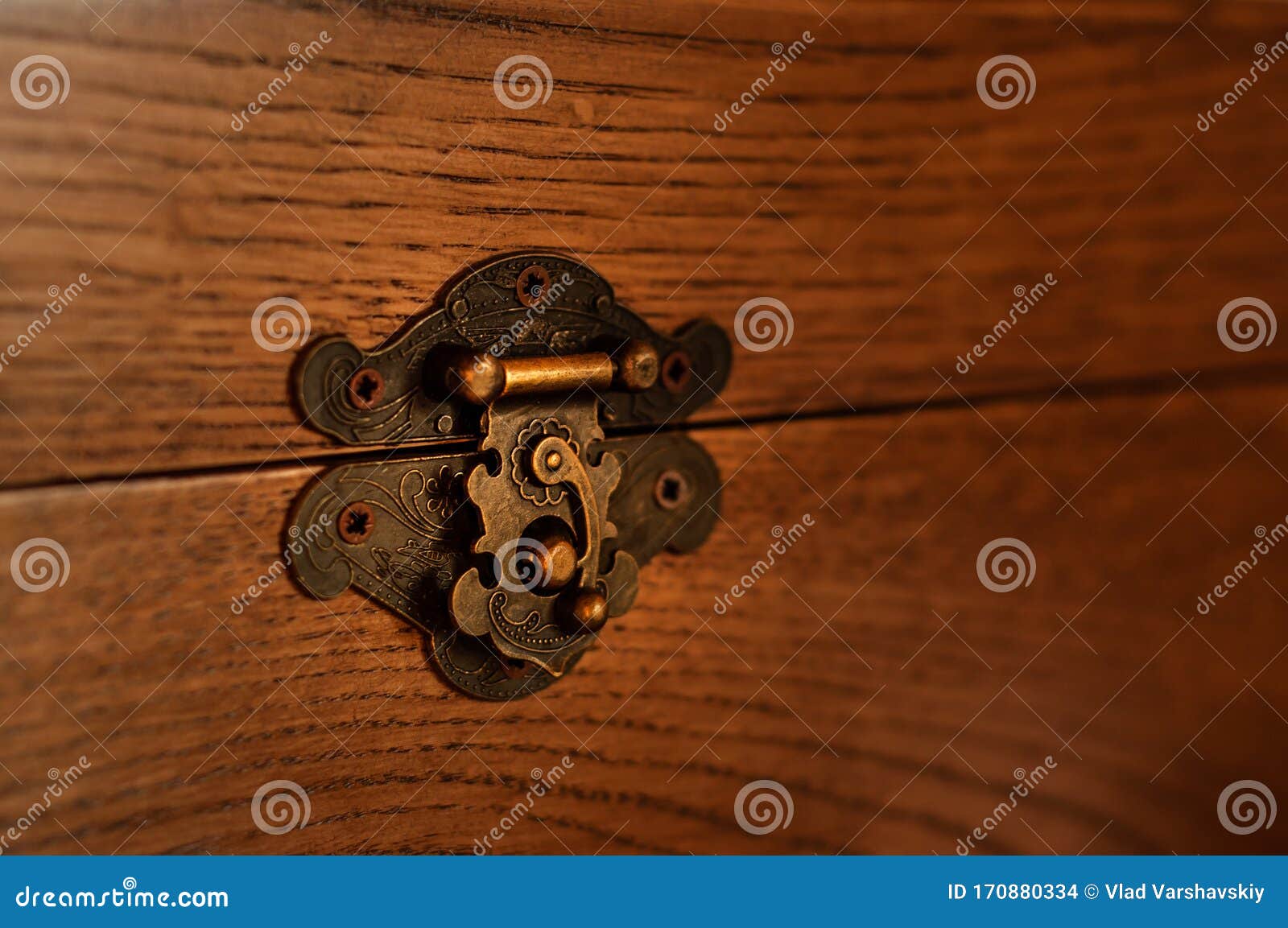 Antique Brass Lock Latch on a Makeshift Oak Wooden Box Stock Photo