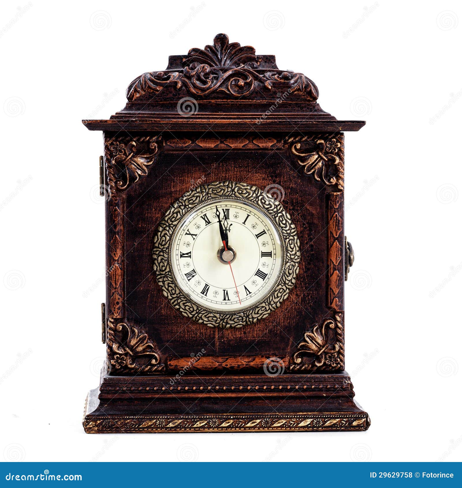 antique clock about to hit midnight or noon