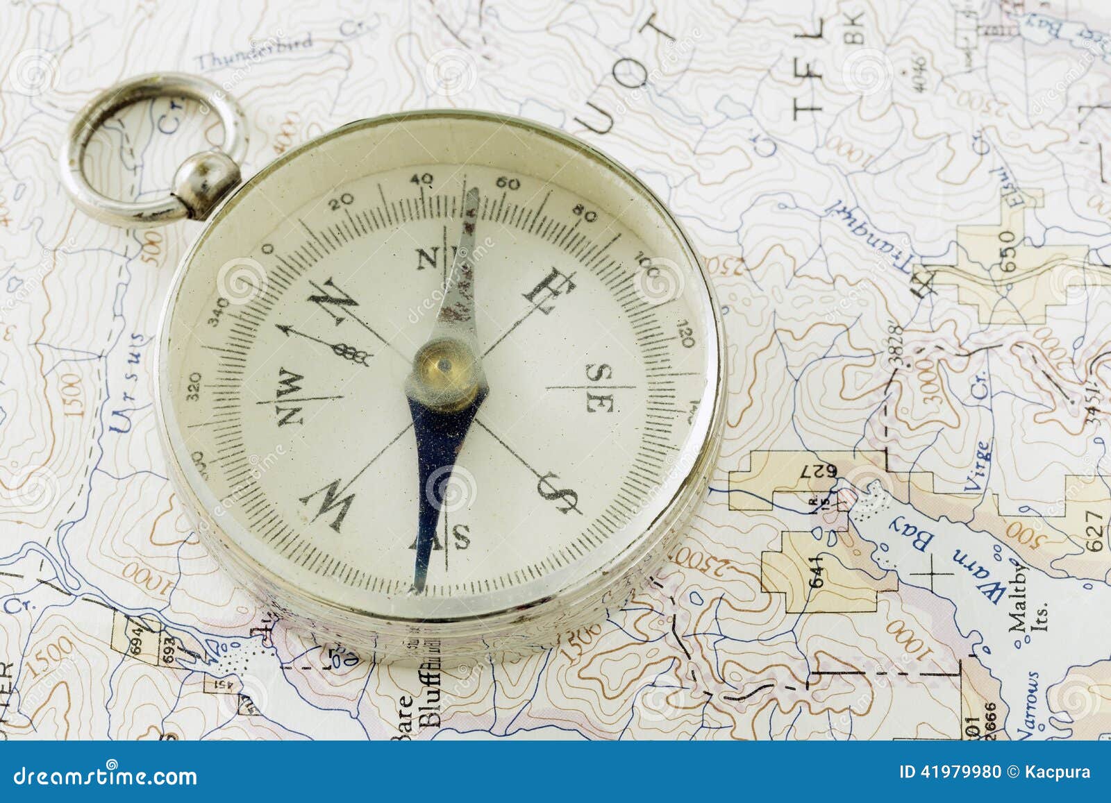 antique compass, prospecting map, and gold