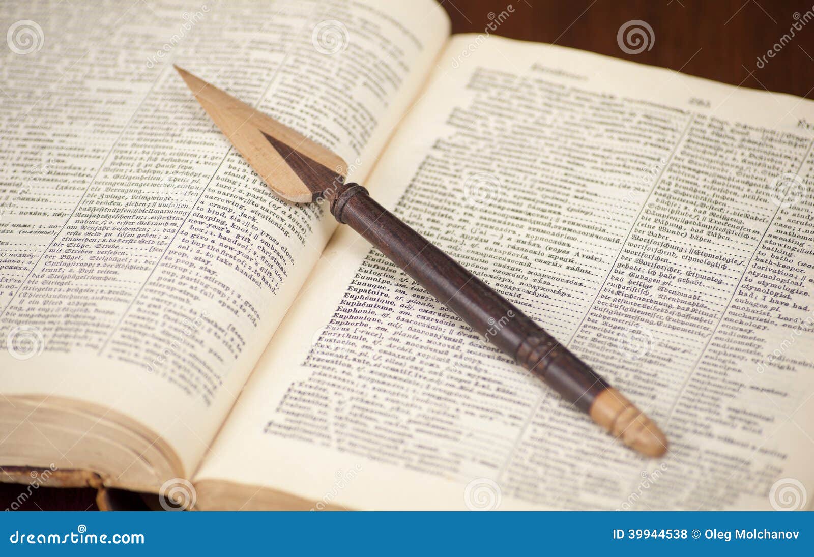 Antique Dictionary with Wooden Knife on it Stock Photo Image of study