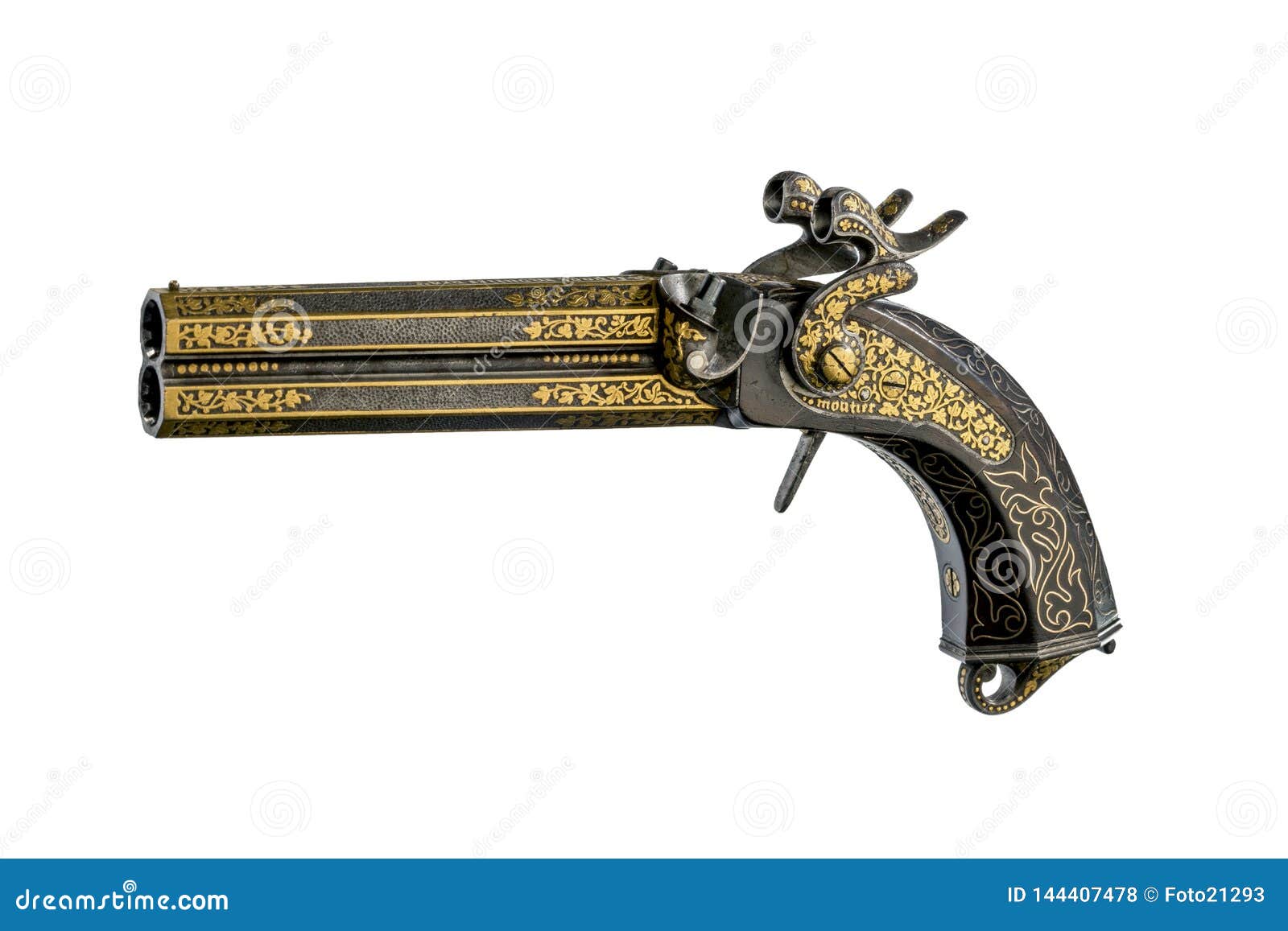 vintage pistol with engraving and carving