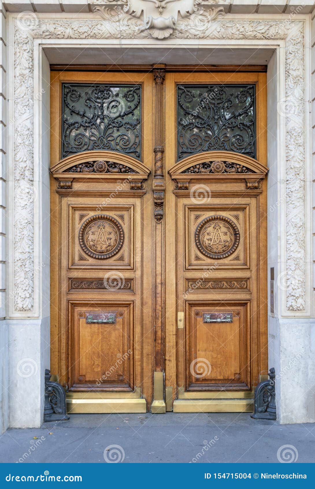 Antique Double Door Entrance of Old Building in Paris France. Vintage  Wooden Doorway and Stucco Fretwork Wall. Stock Photo - Image of carving,  double: 154715004