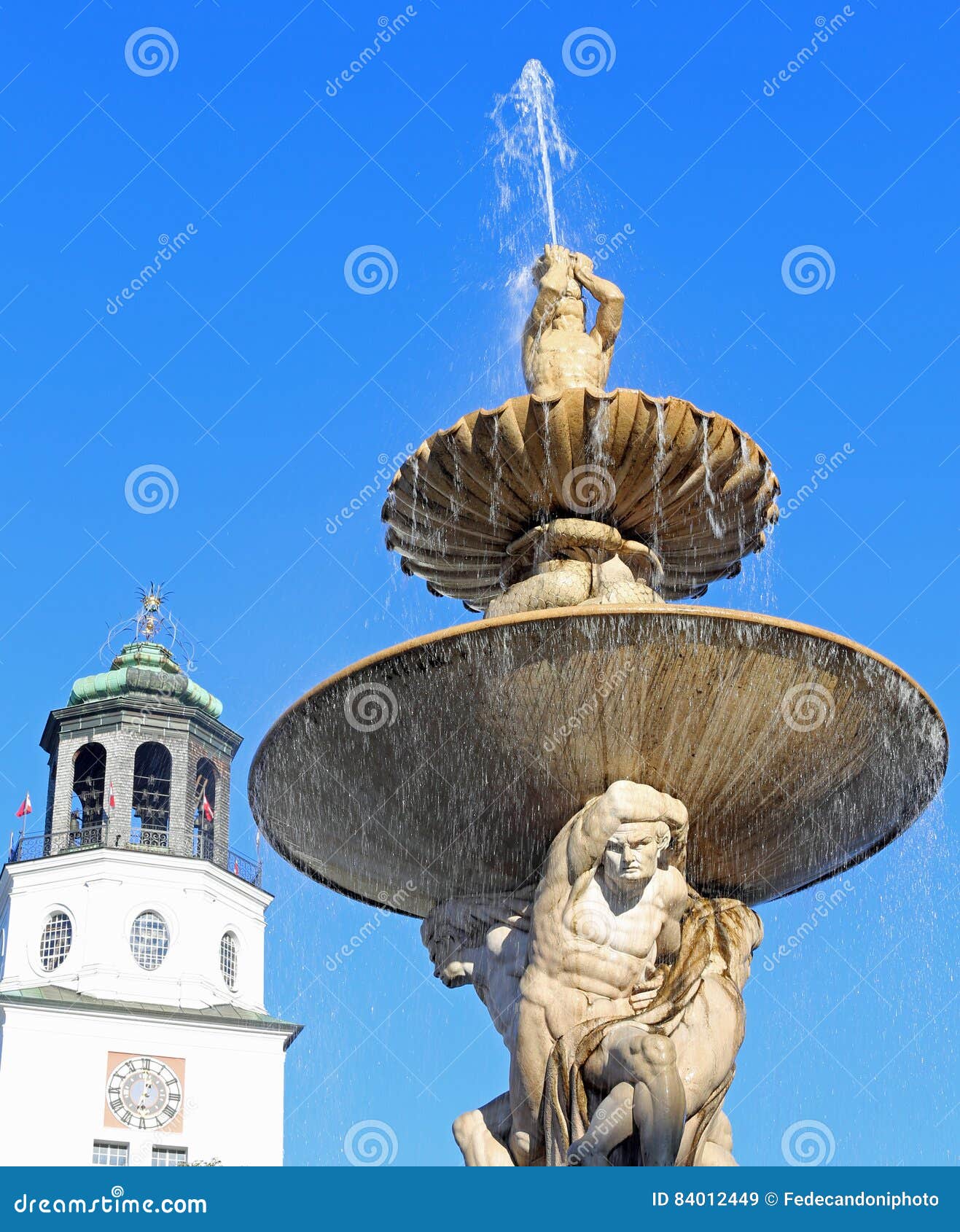 antique fountain with fresh water in the main square of the city