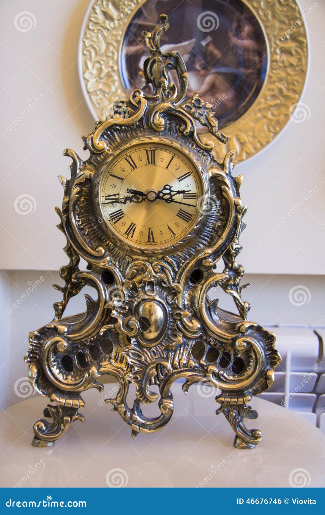 antique goldish clock.