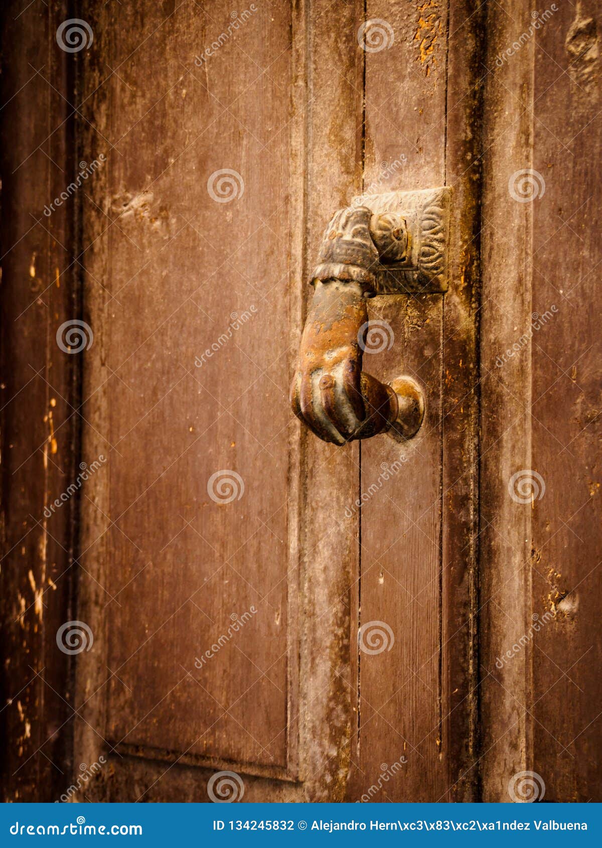 Antique Metal Door Knob Of Beautiful Ocher Colors Stock Photo