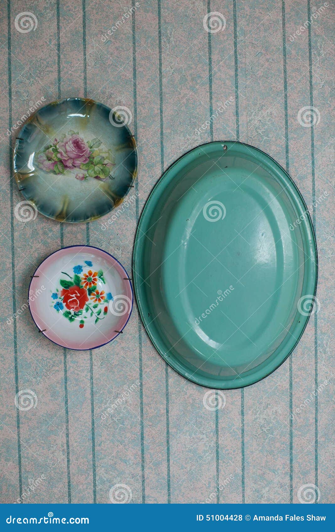 Antique plates on wall stock photo. Image of glazed, teal 51004428