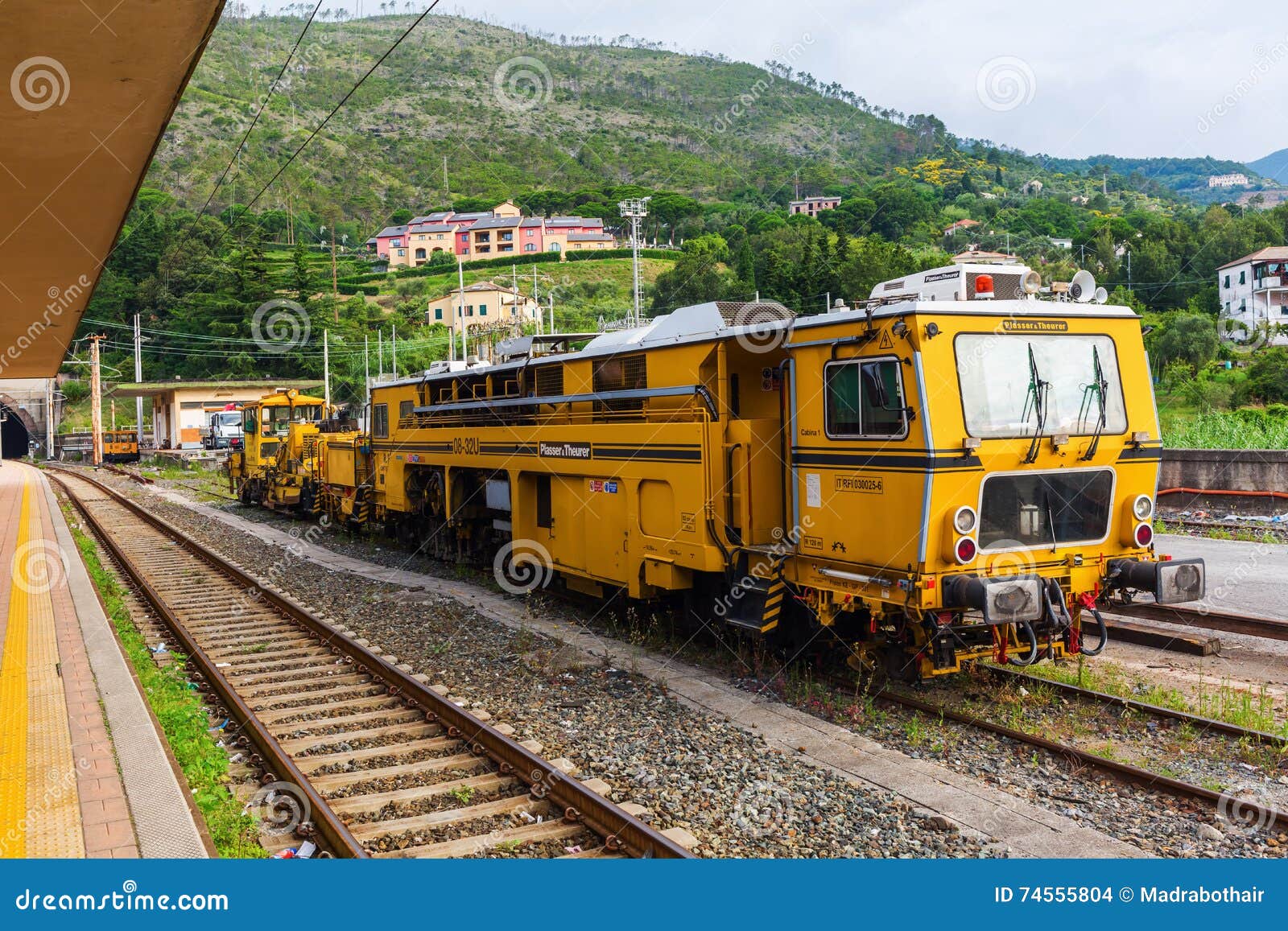 antique train at the rail station in monterosso al mare, cinque terre, italy