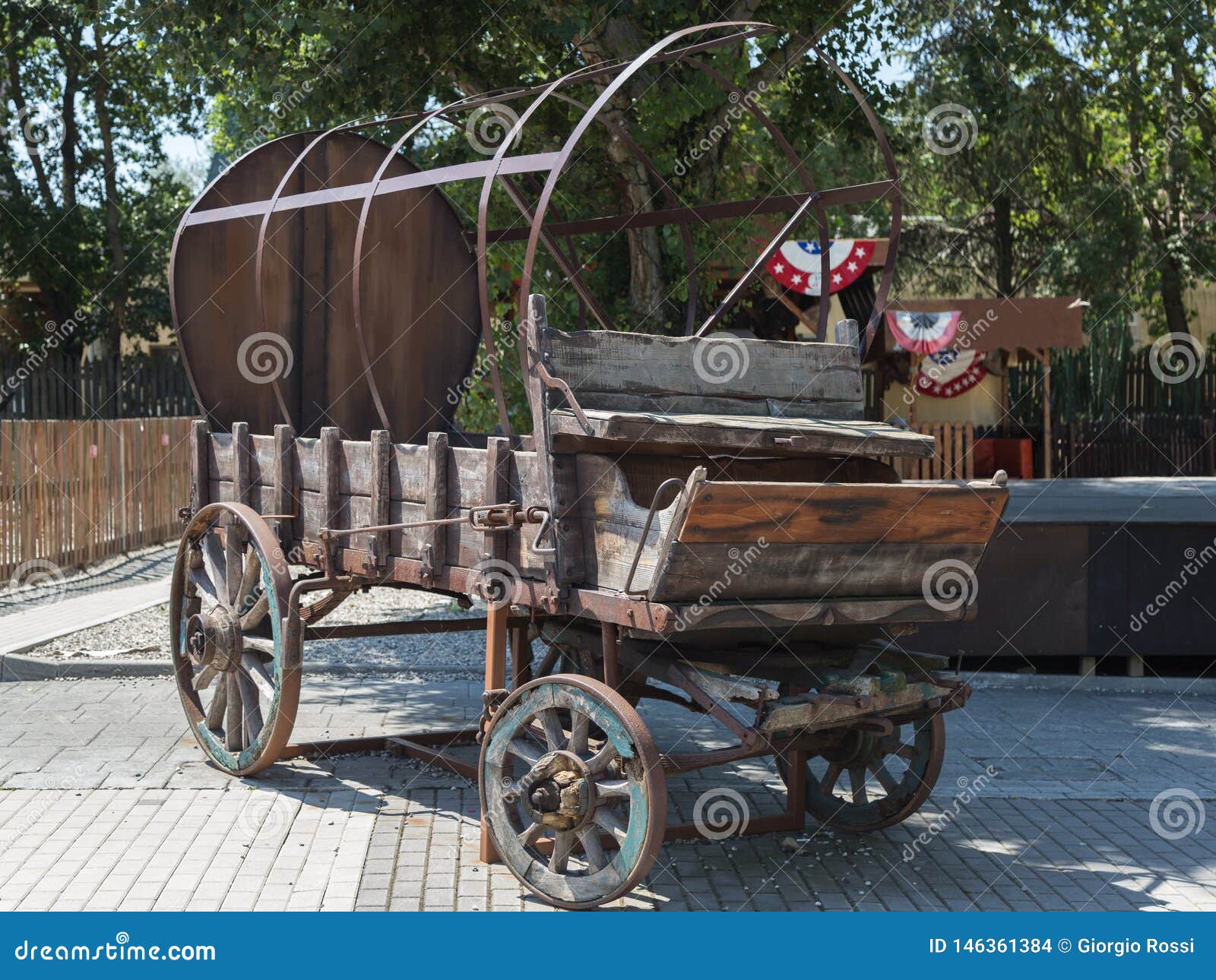 Antique Wooden Wagon with Wheels and Metal Structure Stock Photo