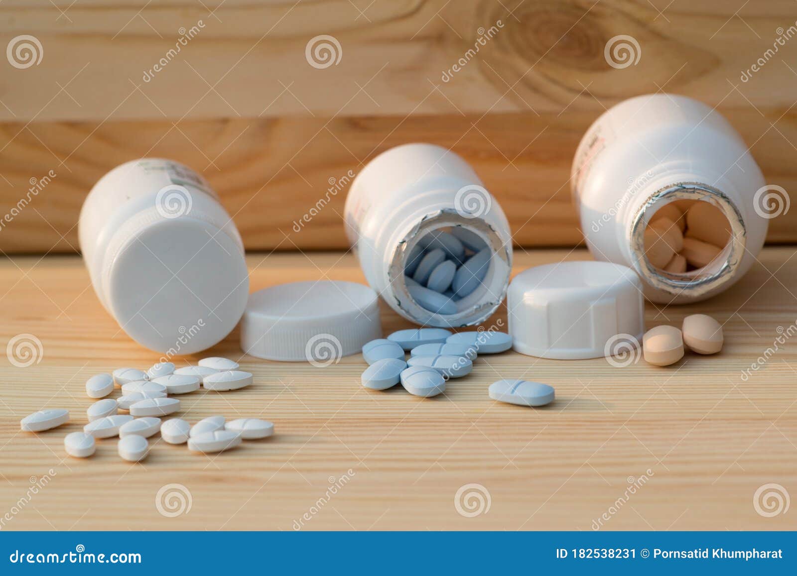 antiretrovirals on wooden background
