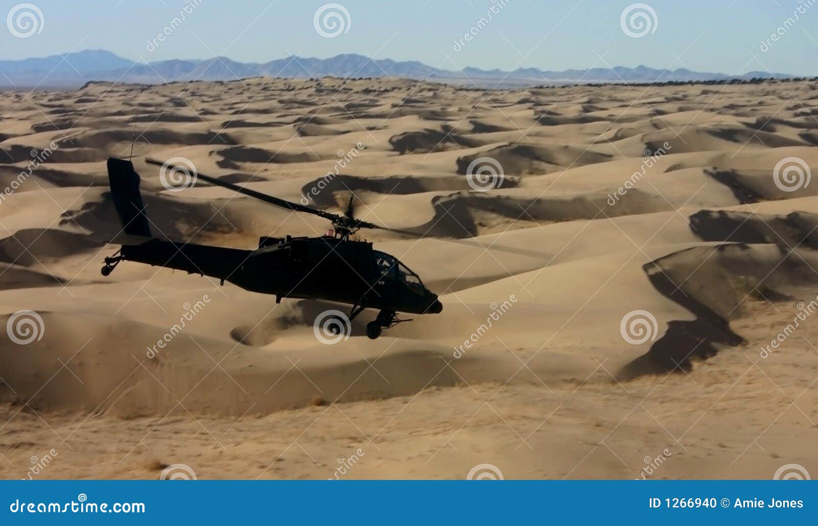 apache over sand dunes