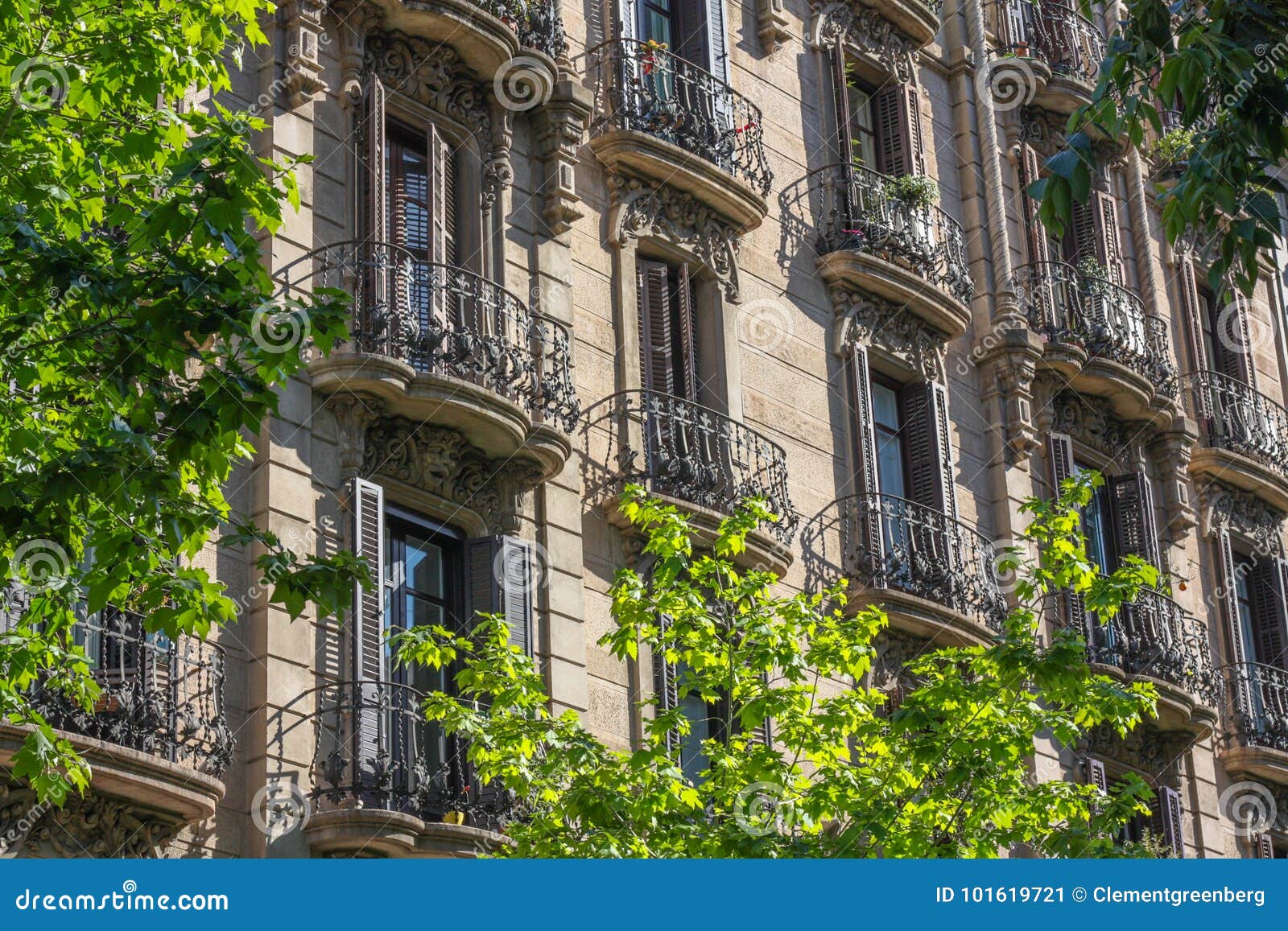 apartments with wrought iron balconies in eixample, barcelona, s