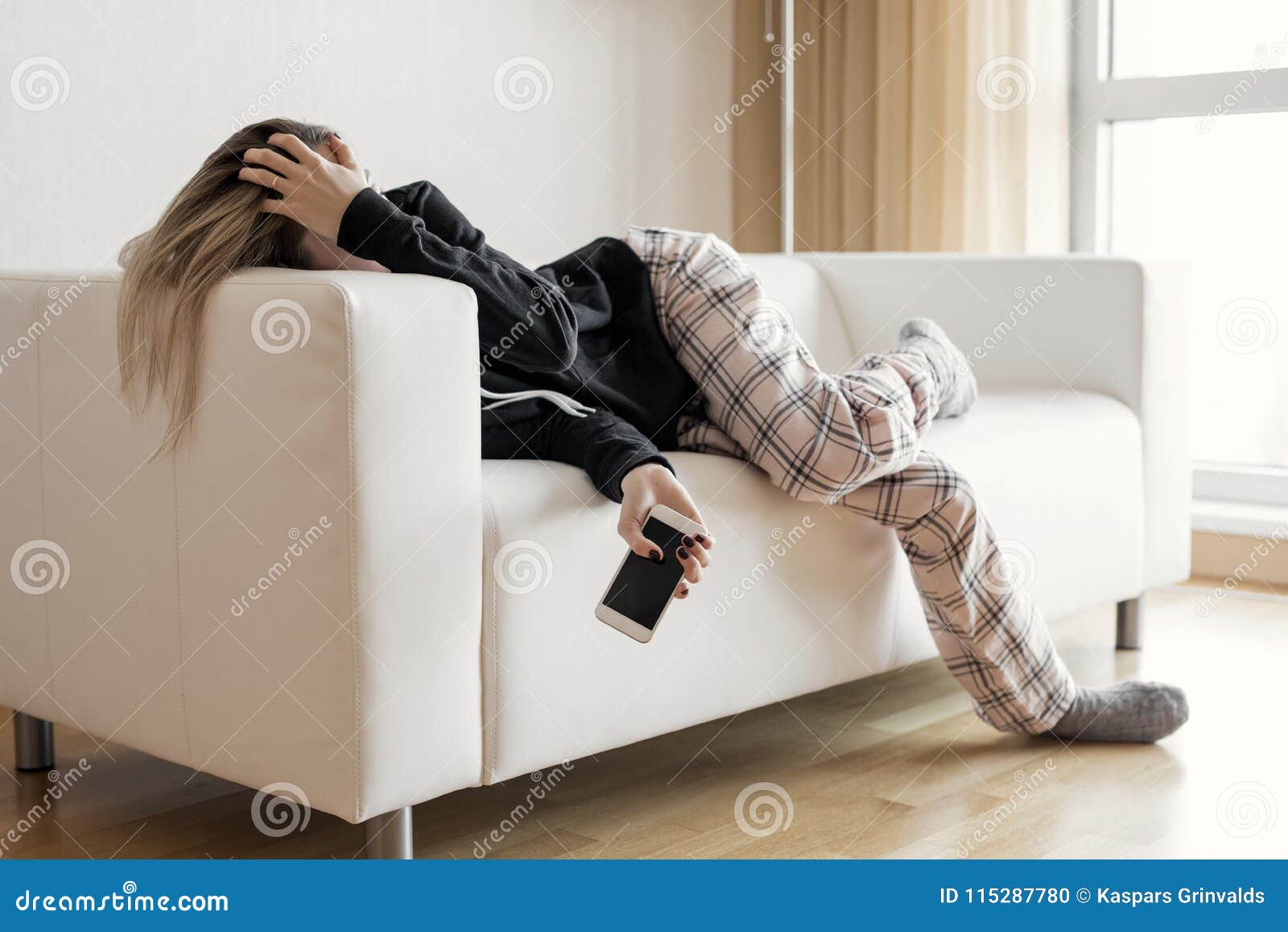 apathic lazy woman lying in sofa