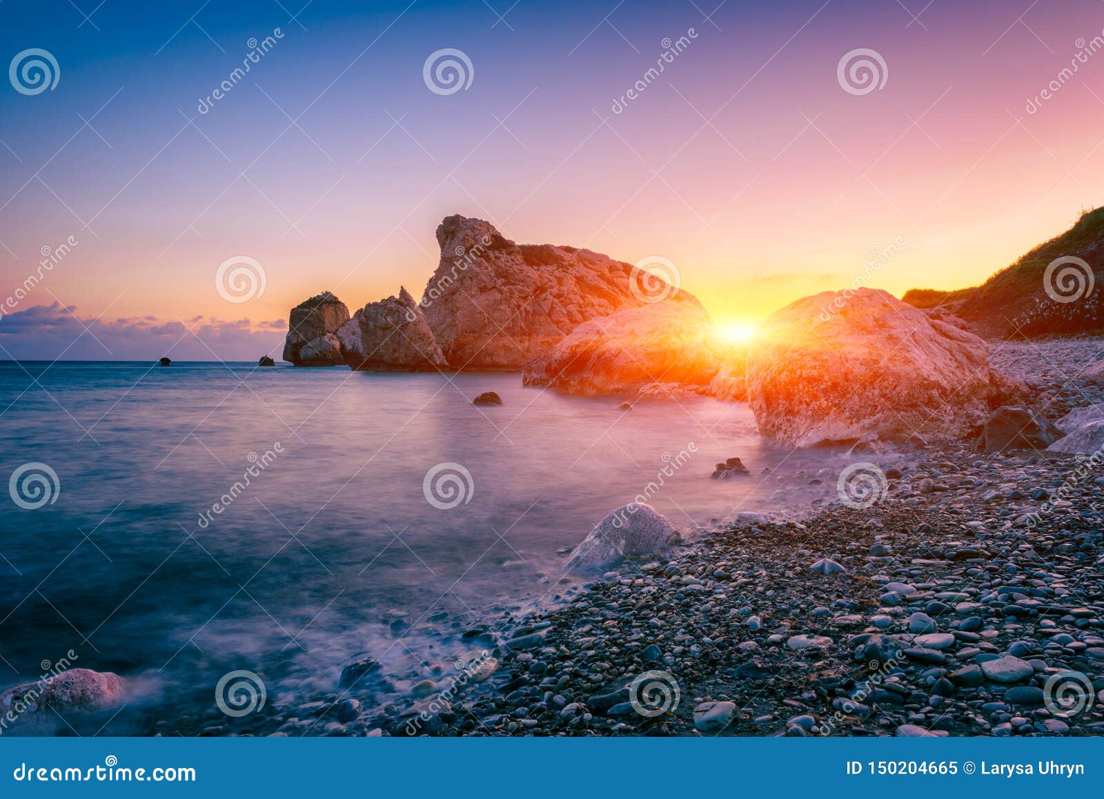 aphrodite`s rock beach, petra tou romiou, the birthplace of goddness aphrodite, paphos, cyprus. amazing sunset seascape