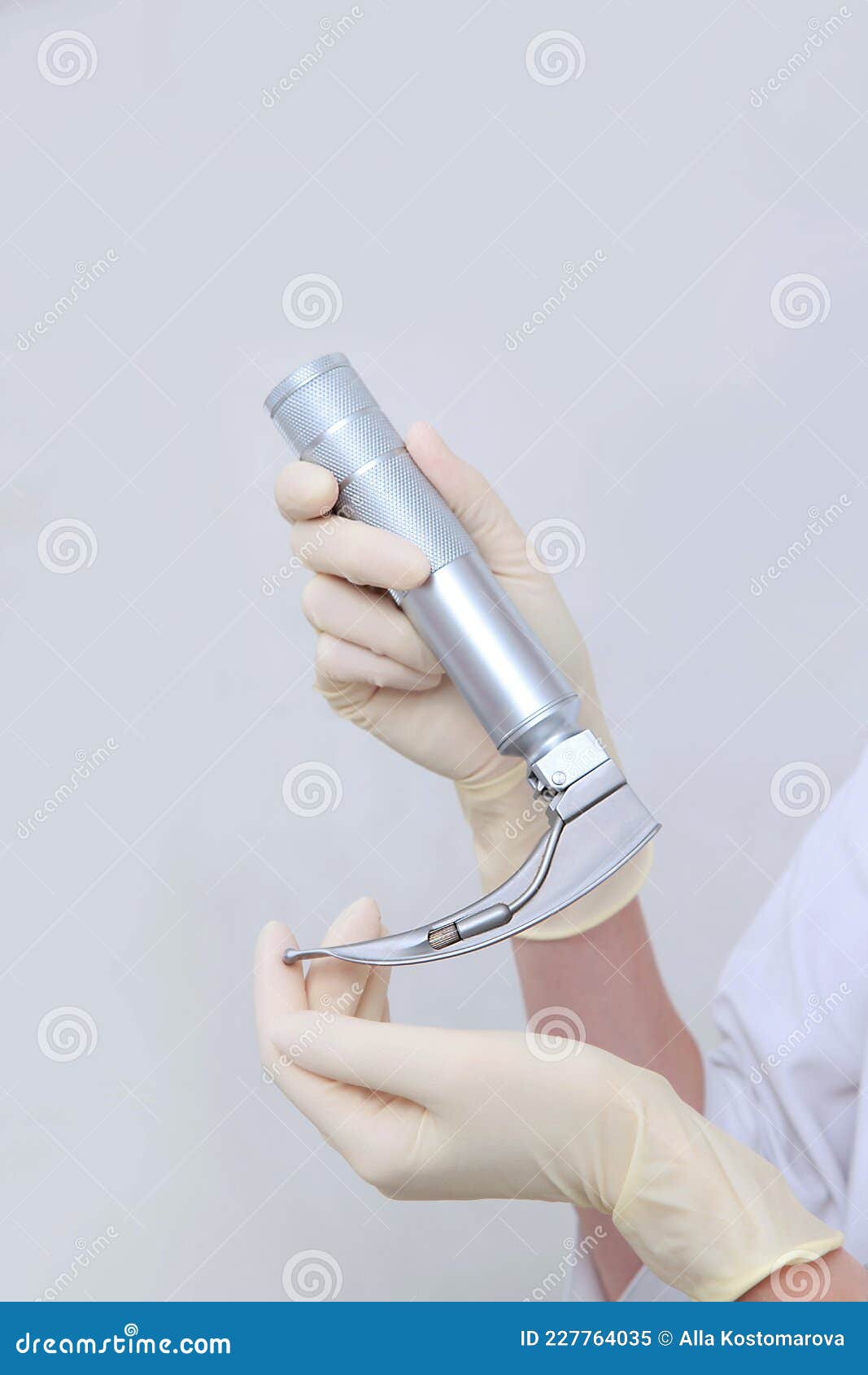 apparatus for tracheal intubation in hands of an anesthesiologist, resuscitator. hands in protective gloves. preparation