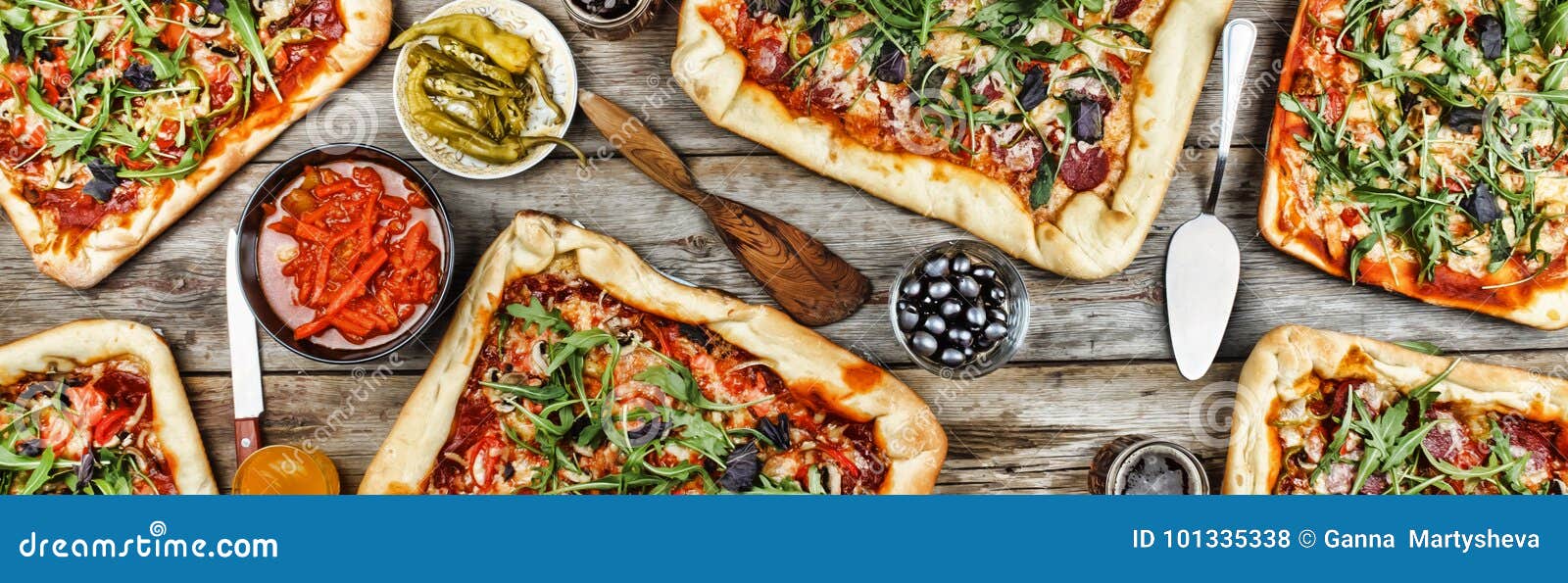 appetizing homemade pizza on a wooden table. friendly feast at home.