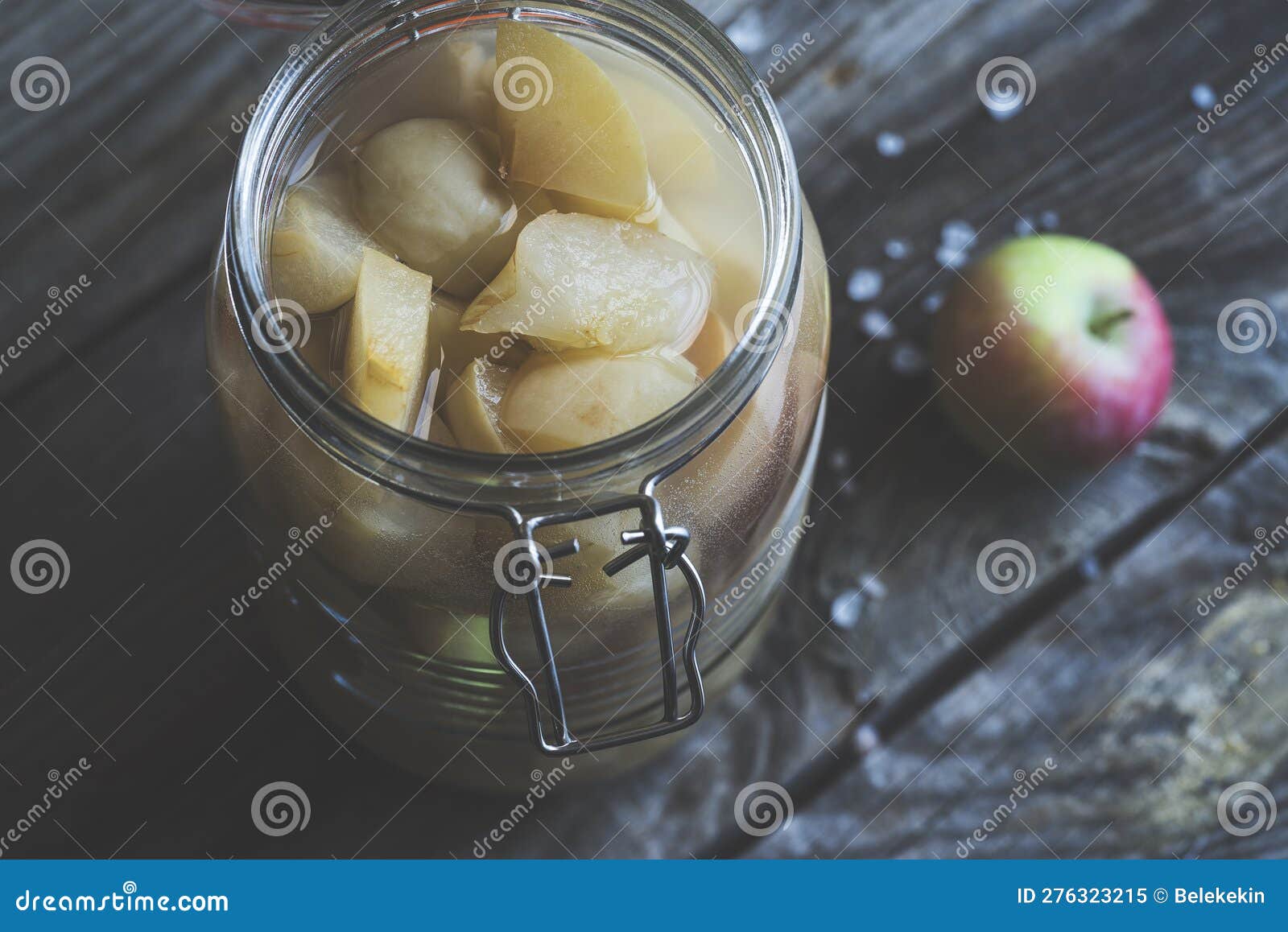 Apple Cider Vinegar in Hinged Lid Jar on Rustic Background Stock Image