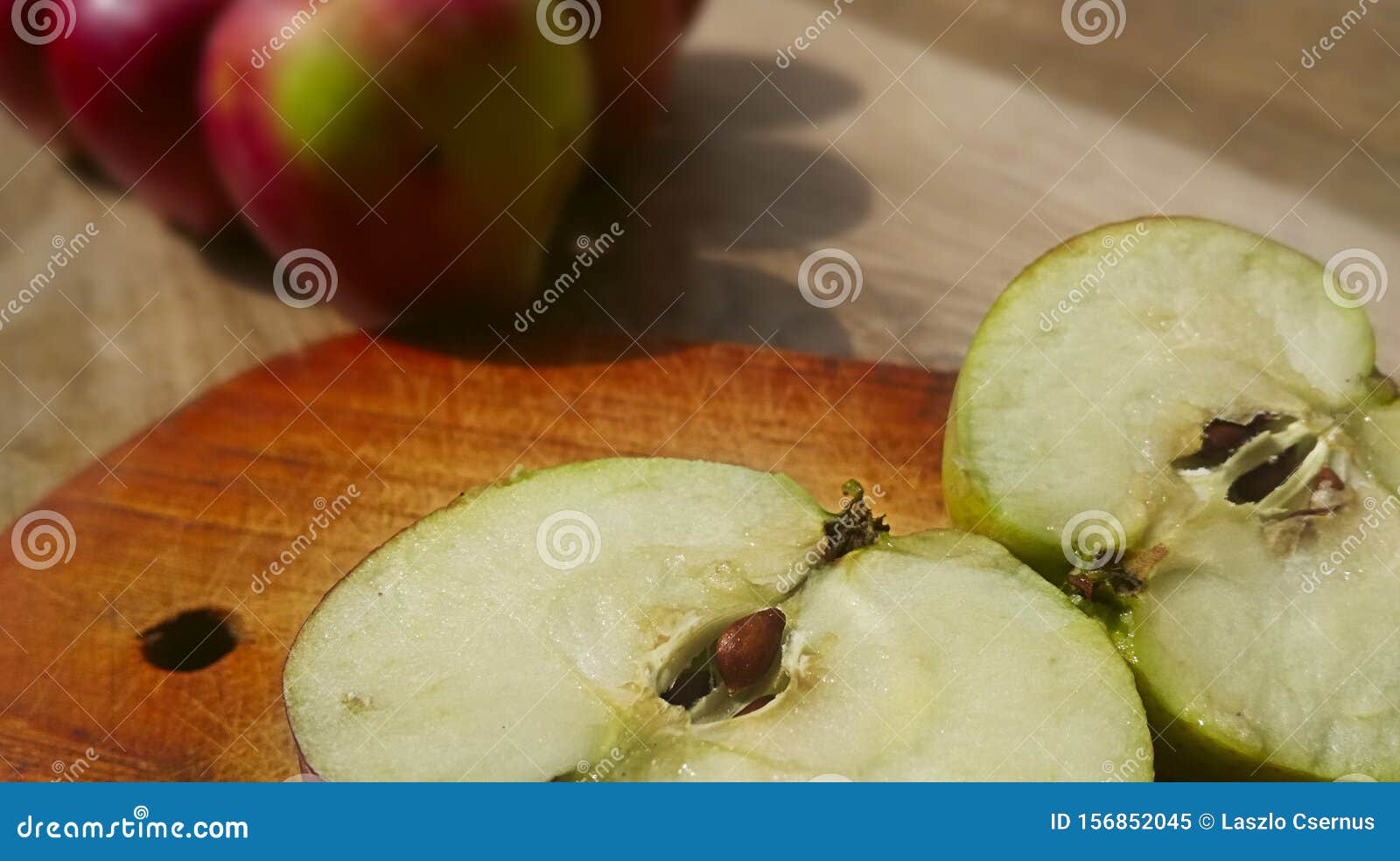 Apple cut in half stock image. Image of delicious, fruit 156852045