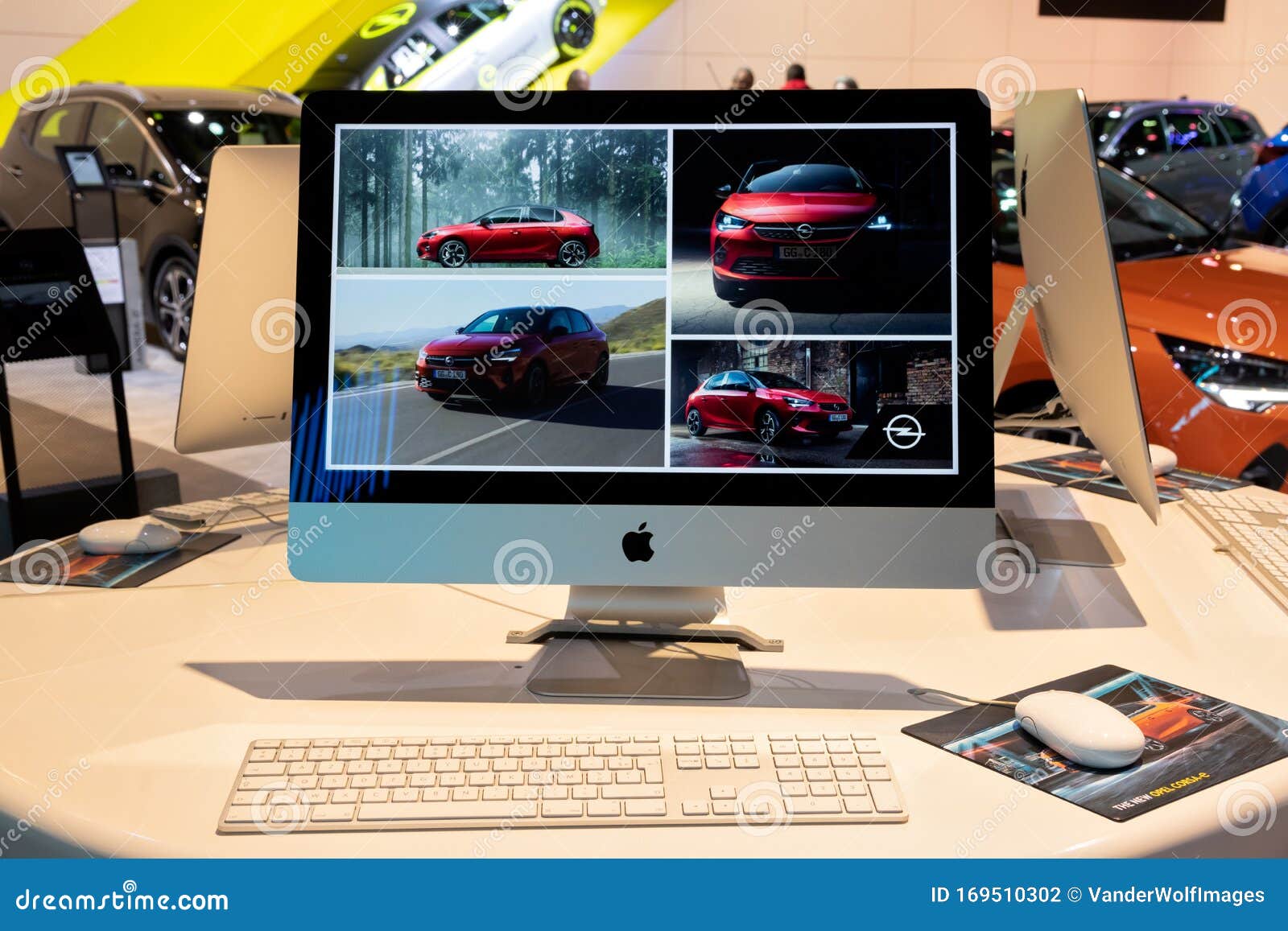 BRUSSELS - JAN 9, 2020: Apple iMac computer with information about the new Opel cars at the Brussels Motor Show white background office x auto table modern technology work design display brand nobody concept communication education screen workplace creative creativity web graphic desk editorial internet keyboard monitor pc branding designer marketing grandland desktop i-mac macbook website workspace illustrative