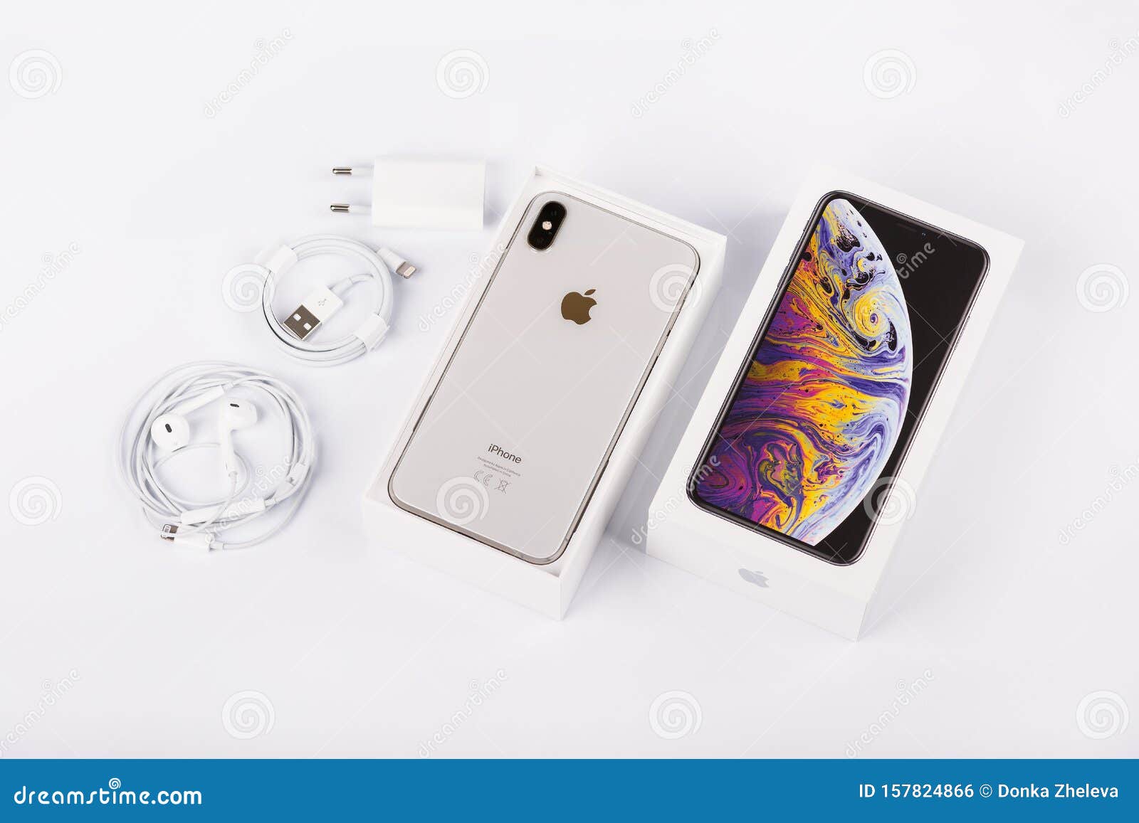 Apple IPhone Xs Max Silver on White Background, Back View. Charger, Earpods  and Adapter. Editorial Photo - Image of bulgaria, device: 157824866