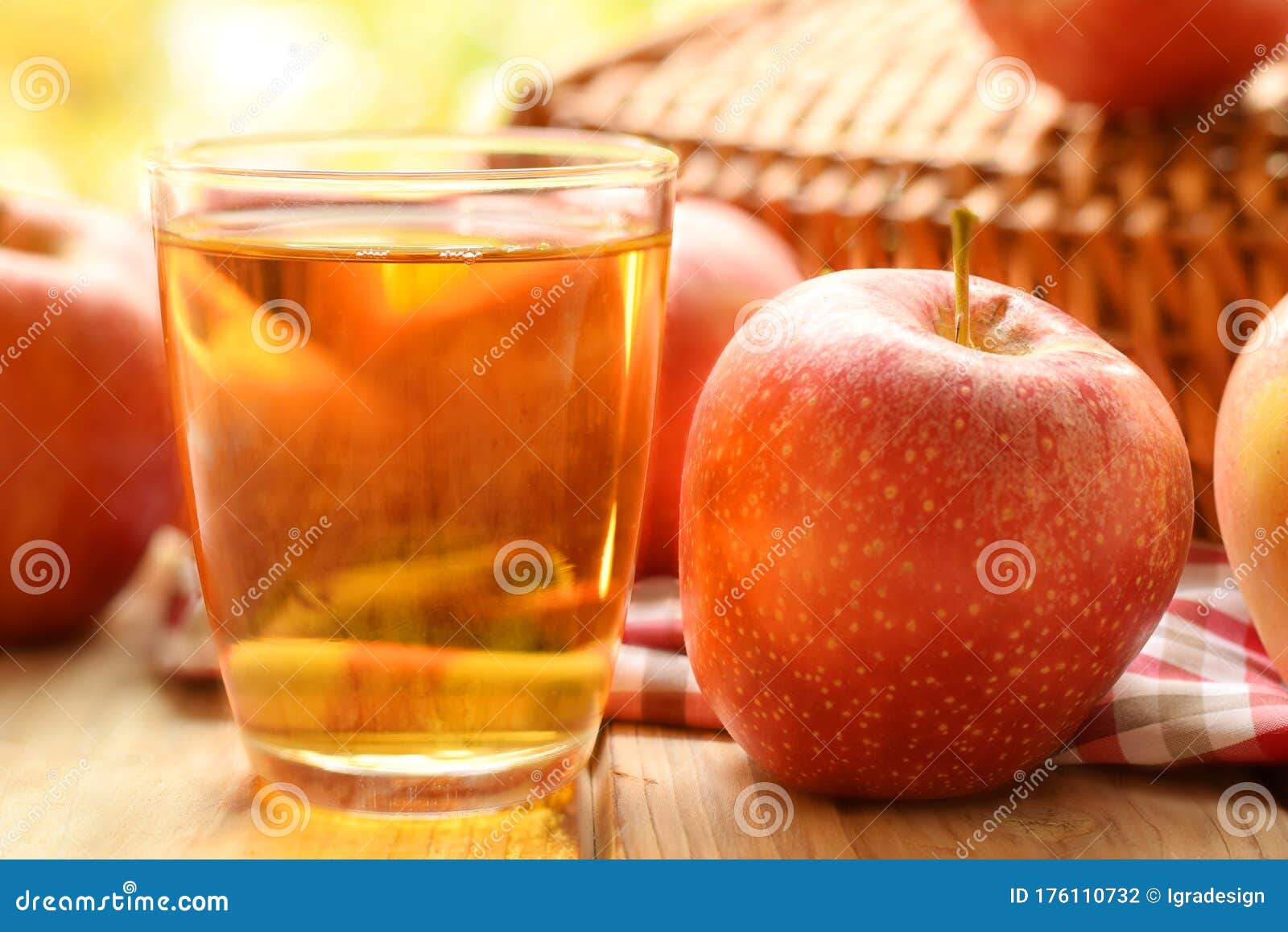 Apple juice in drink glass stock photo. Image of wooden 176110732