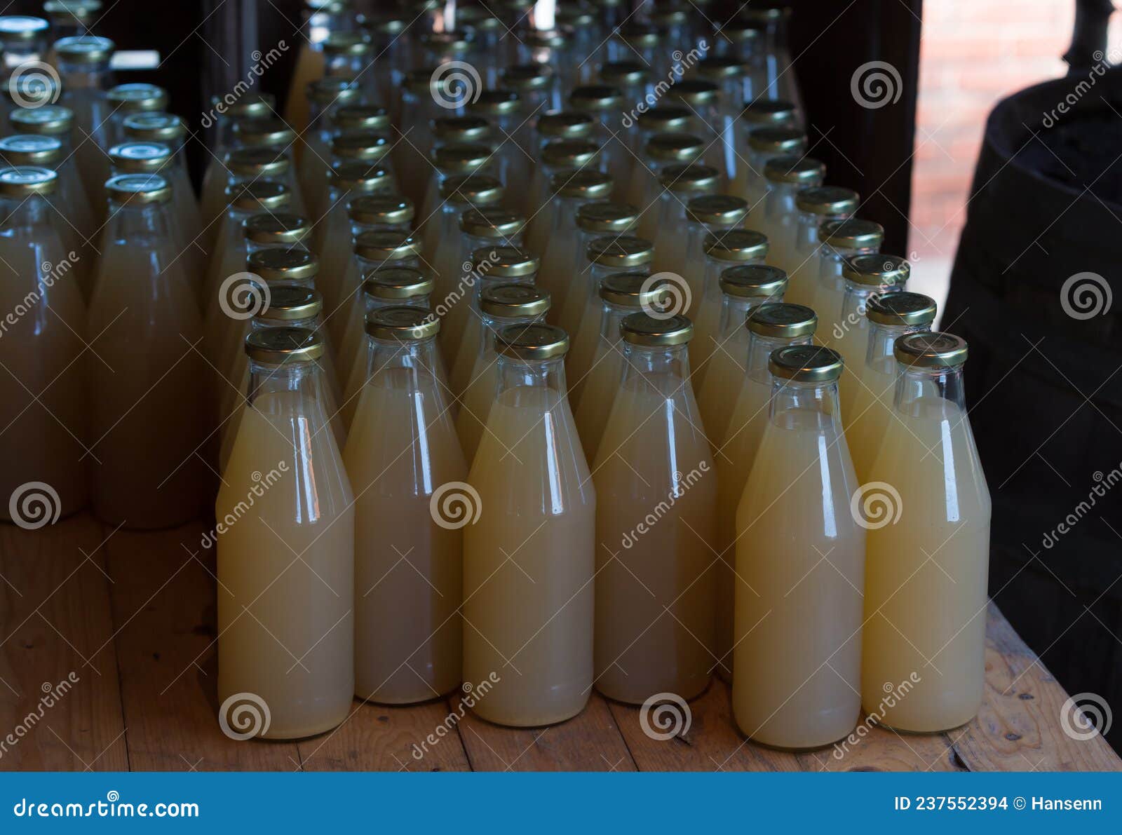Apple juice in bottles stock photo. Image of biologic - 237552394