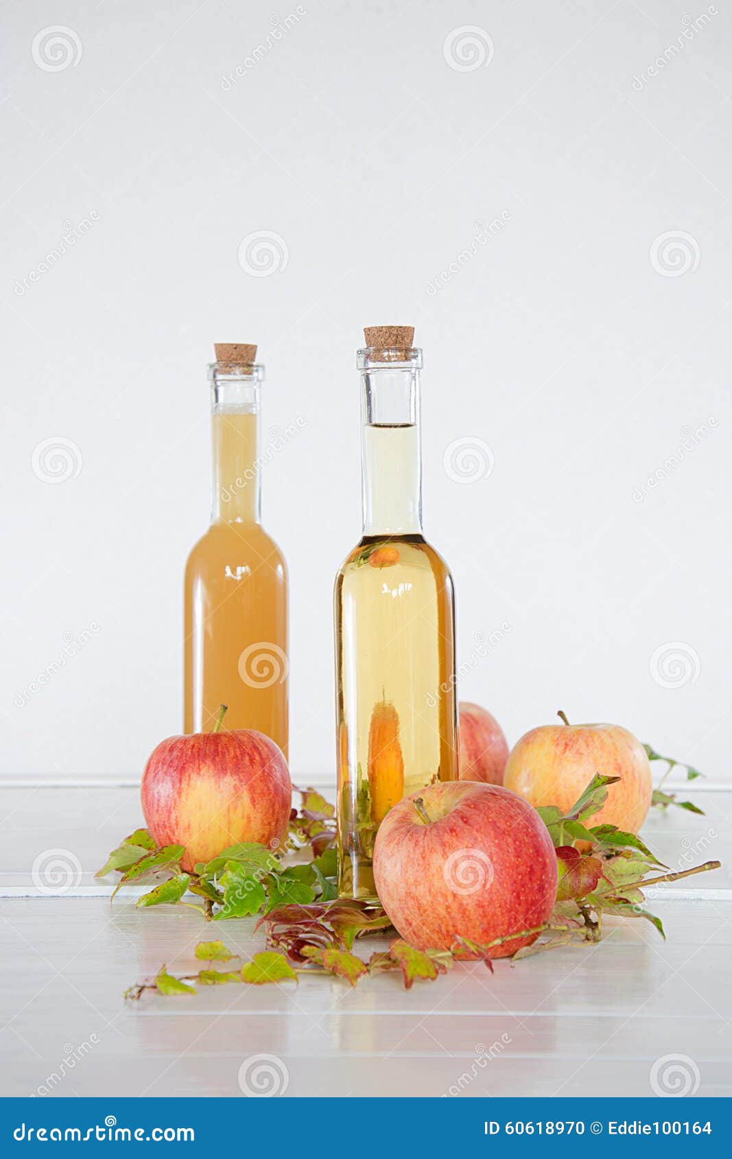 Apple juice in bottles stock photo. Image of sheets, bottle - 60618970