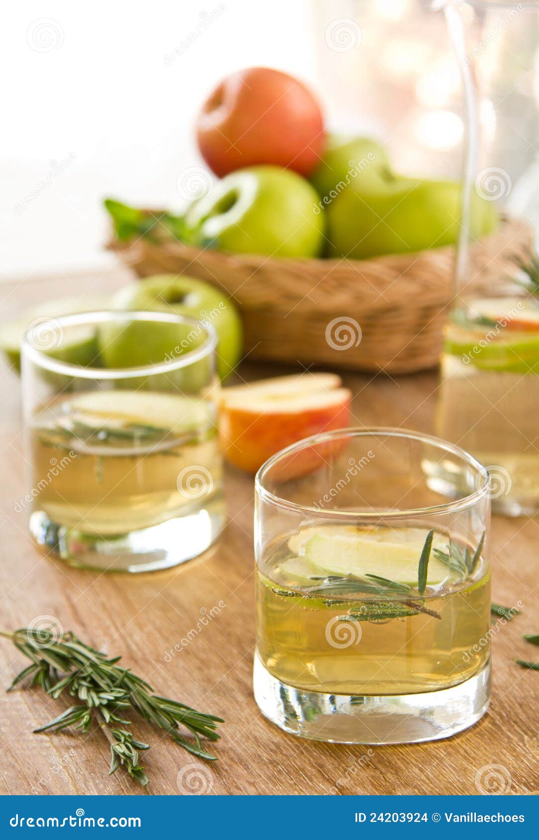 Apple juice with rosemary stock photo. Image of sugar 24203924