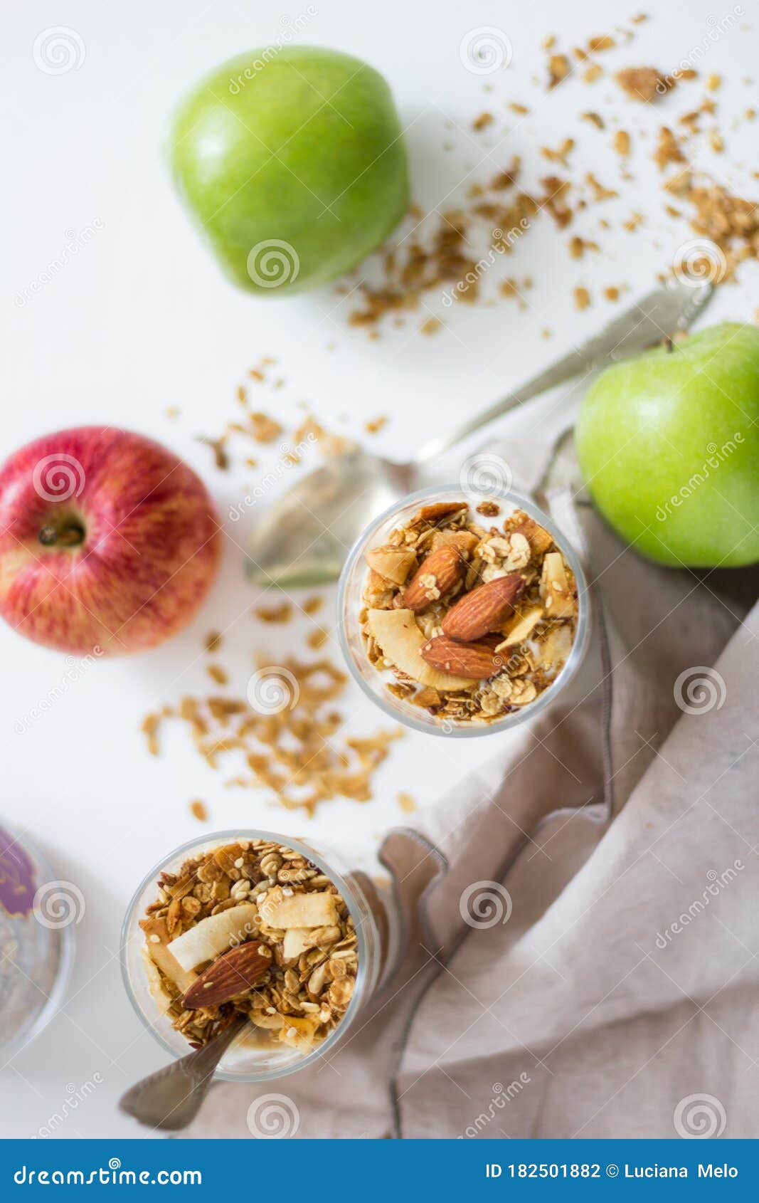 Apple Parfait with Yogurt and Granola on a Marble Surface Stock Photo