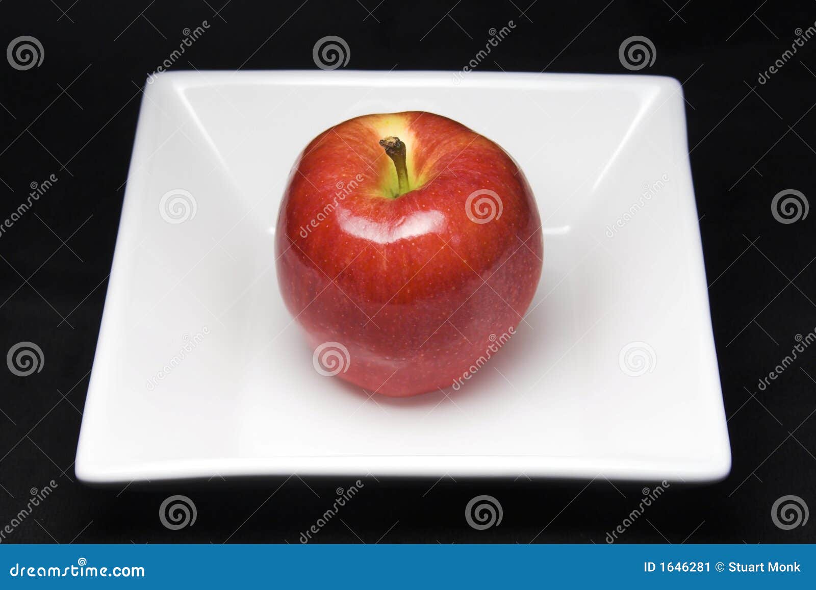 Apple on plate stock image. Image of white, black, sliced - 1646281
