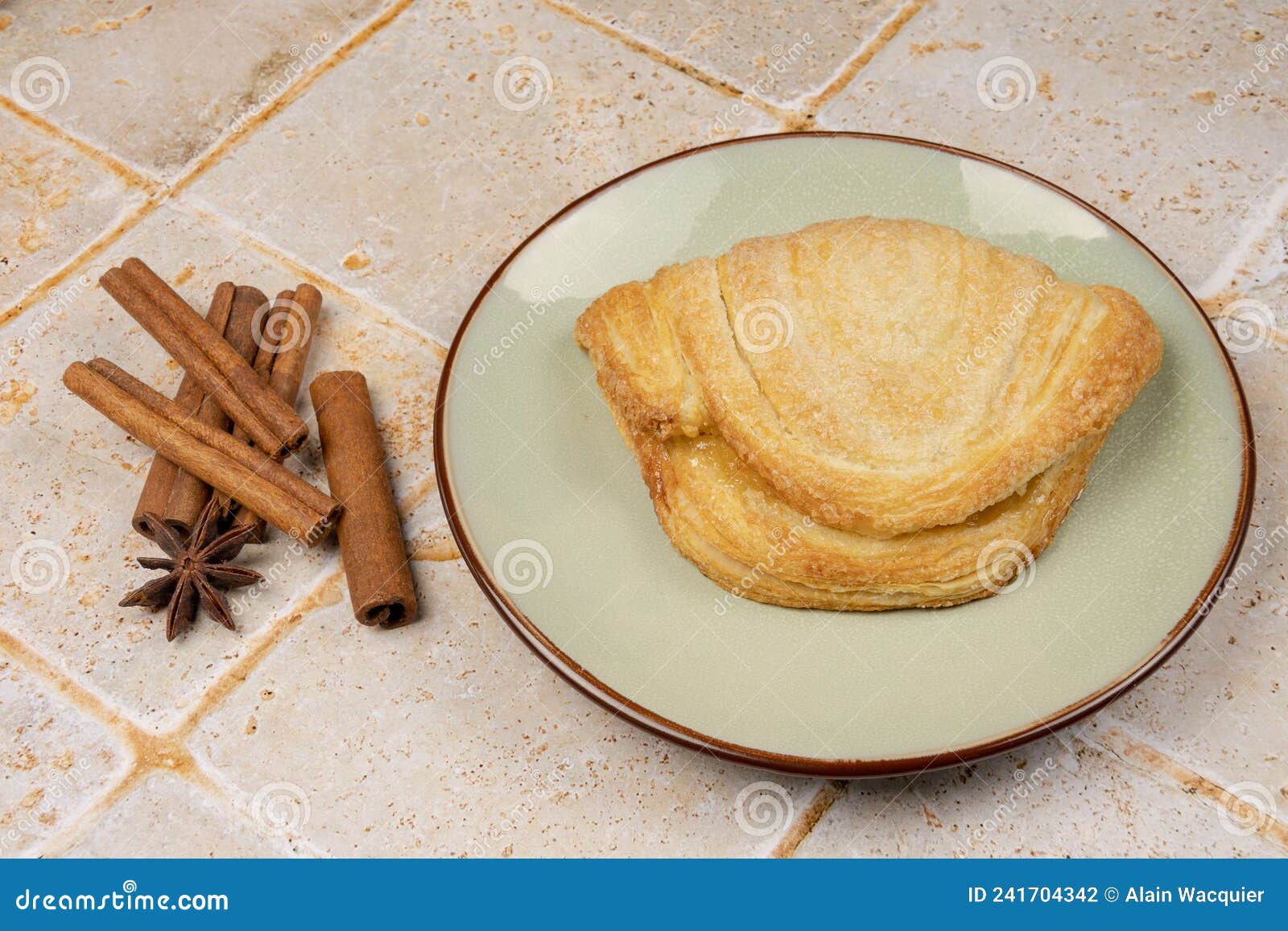 Apple Puff Pastry in a Plate with Cinnamon Sticks Stock Photo Image