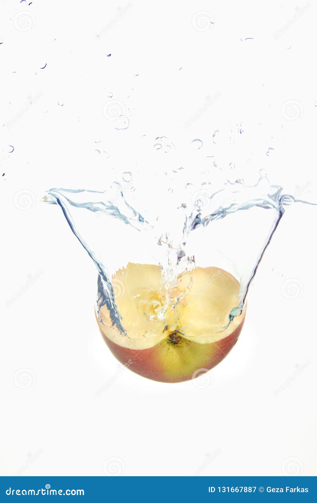 apple slice spash in water on white background