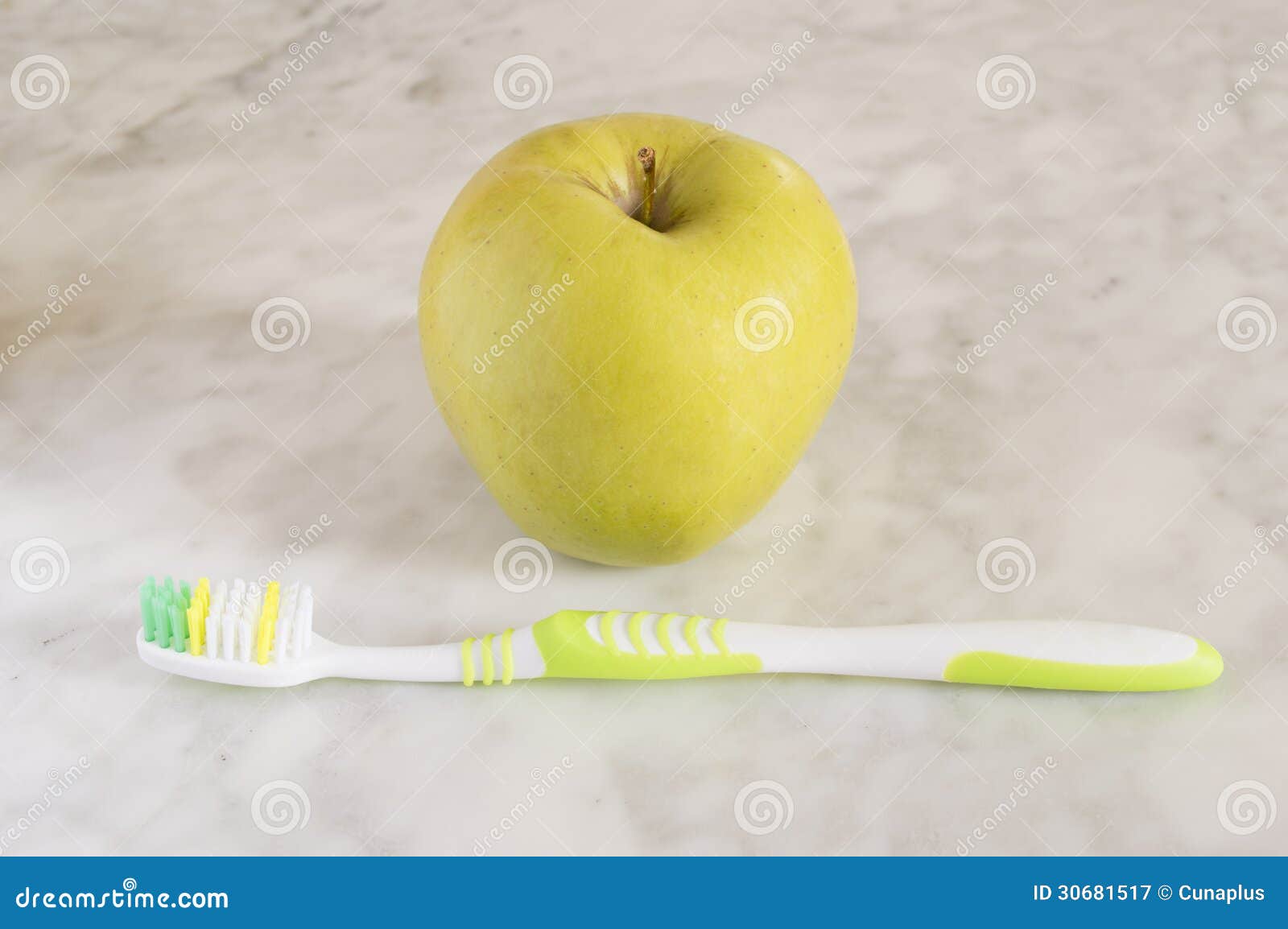 Apple with a toothbrush stock image. Image of concept 30681517