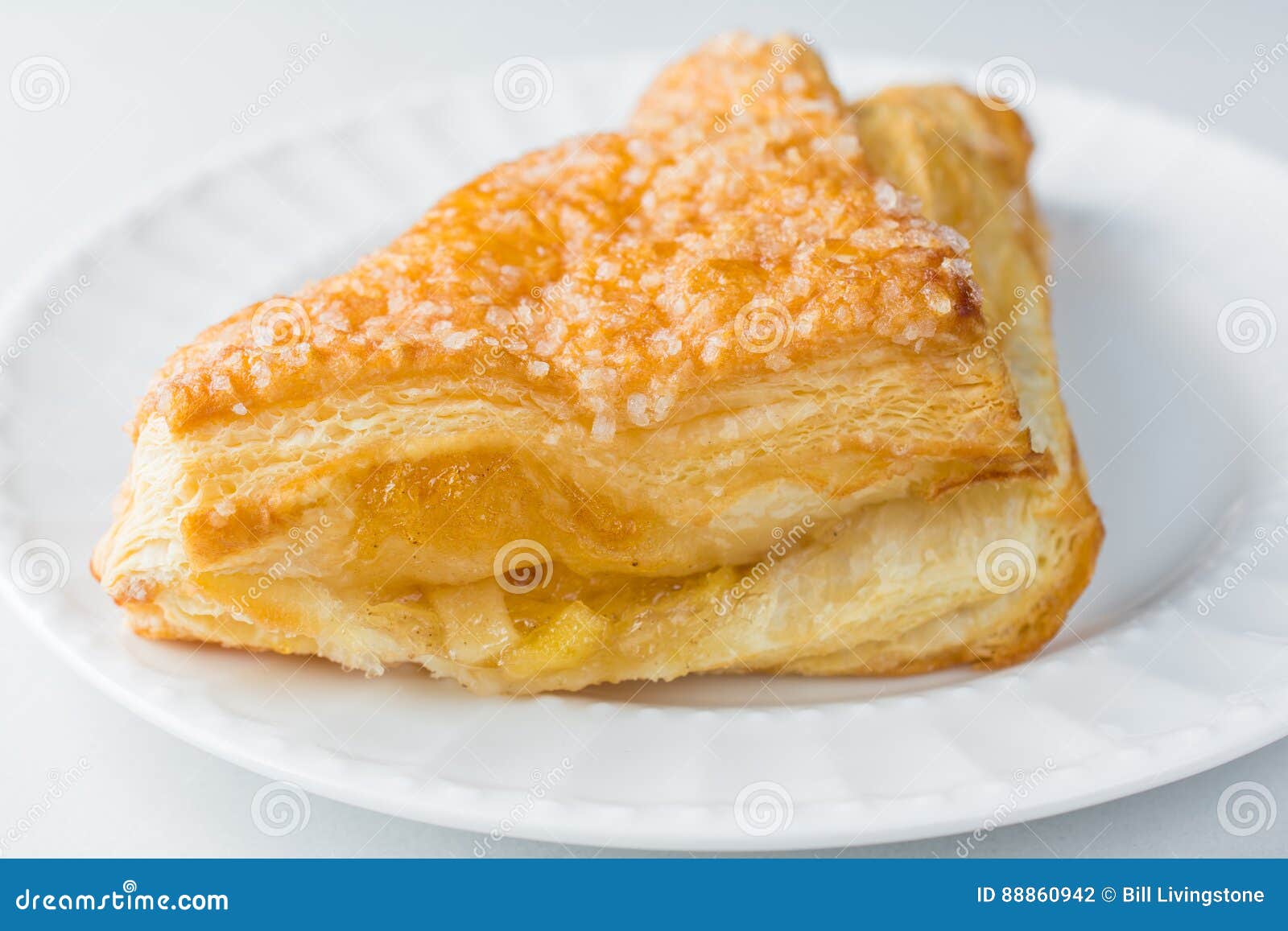 Apple Turnover Pastry on Plate with White Background Close Up Stock