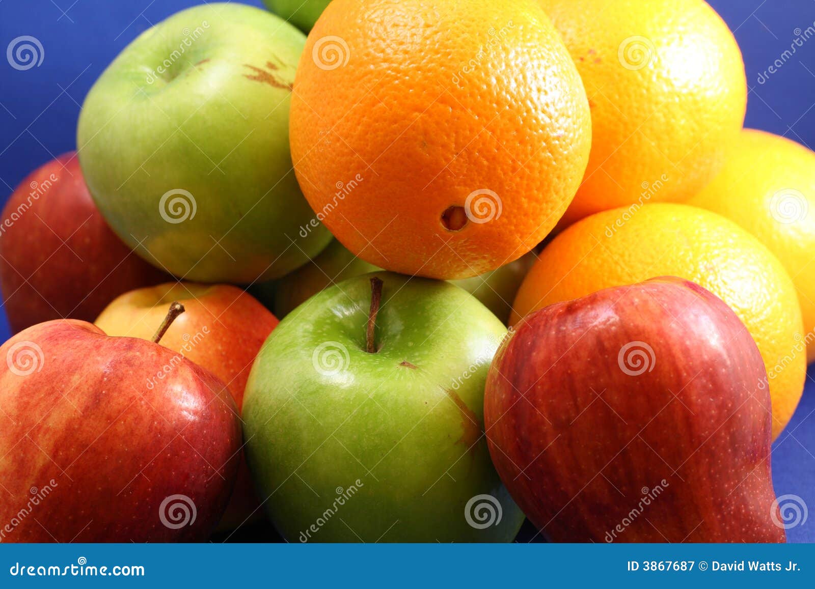 Apples & Oranges stock image. Image of fruit, blue 3867687