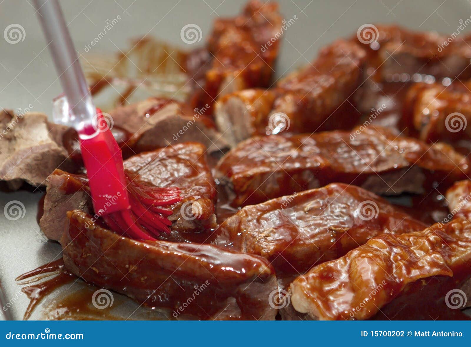 Applying bbq sauce stock photo. Image of brown, drip 15700202