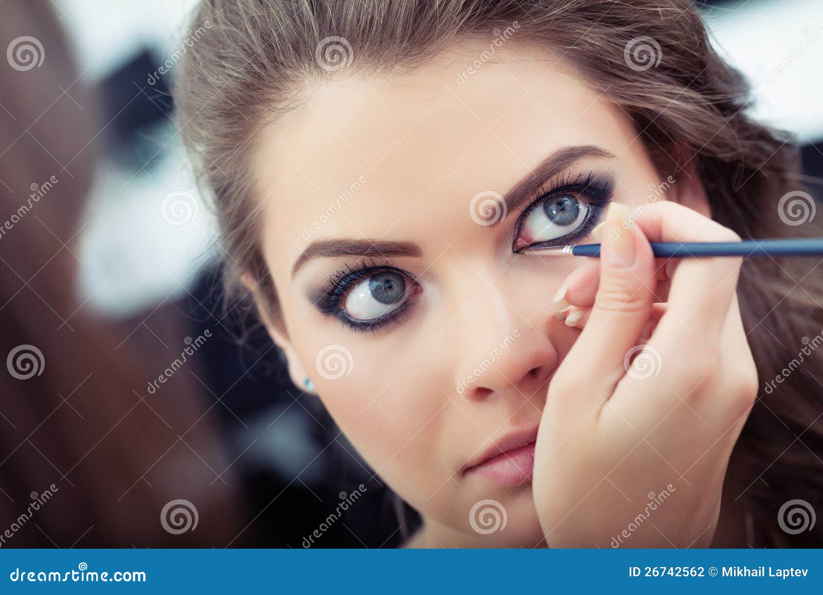 Applying liquid eyeliner stock photo. Image of femininity 26742562