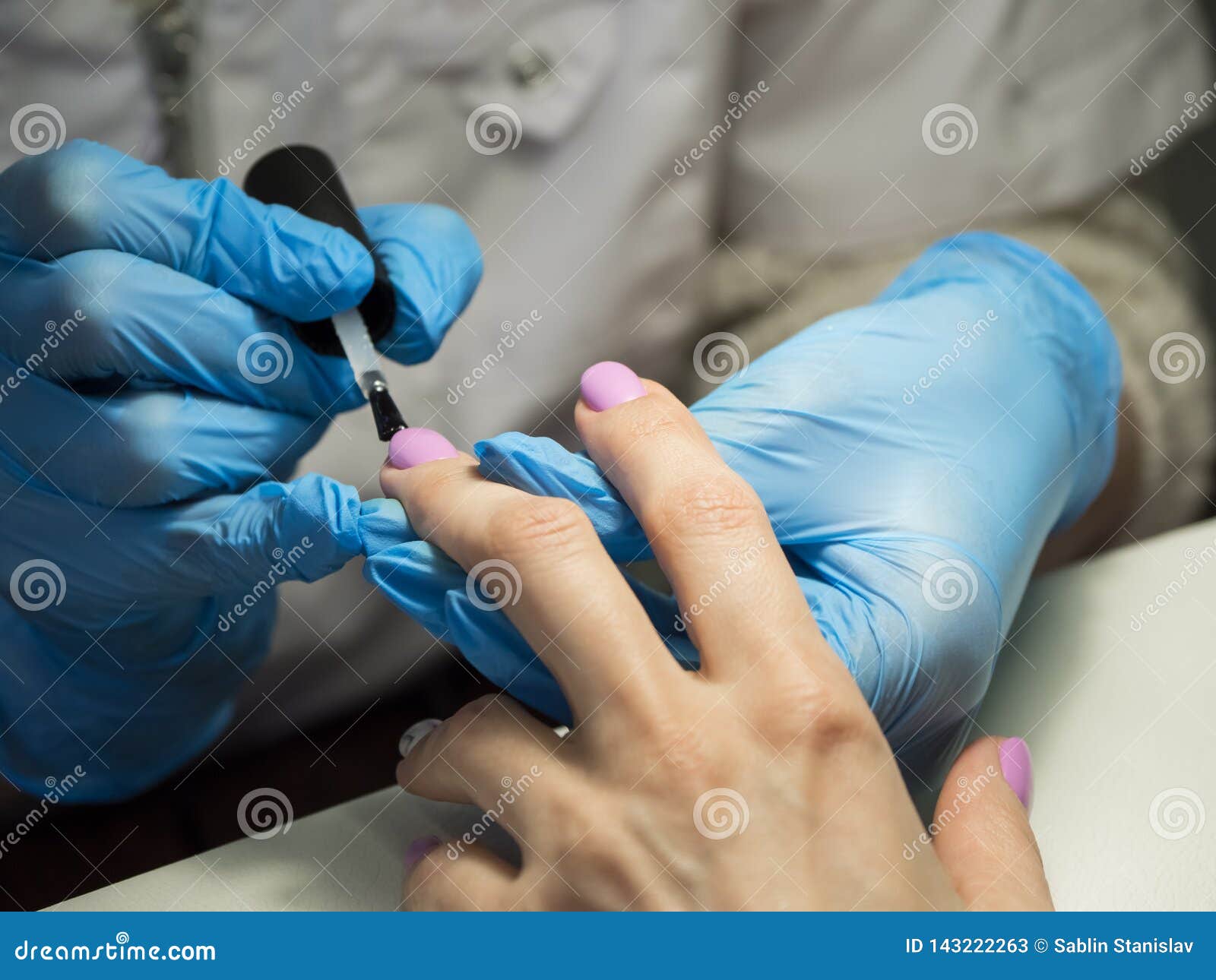 Applying Nail Polish in the Nail Salon. Close Up. Stock Image Image