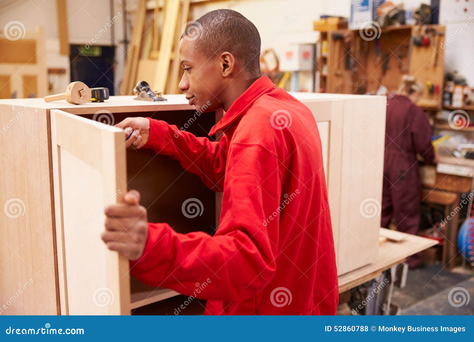 Apprentice Building Furniture in Carpentry Stock Photo Image